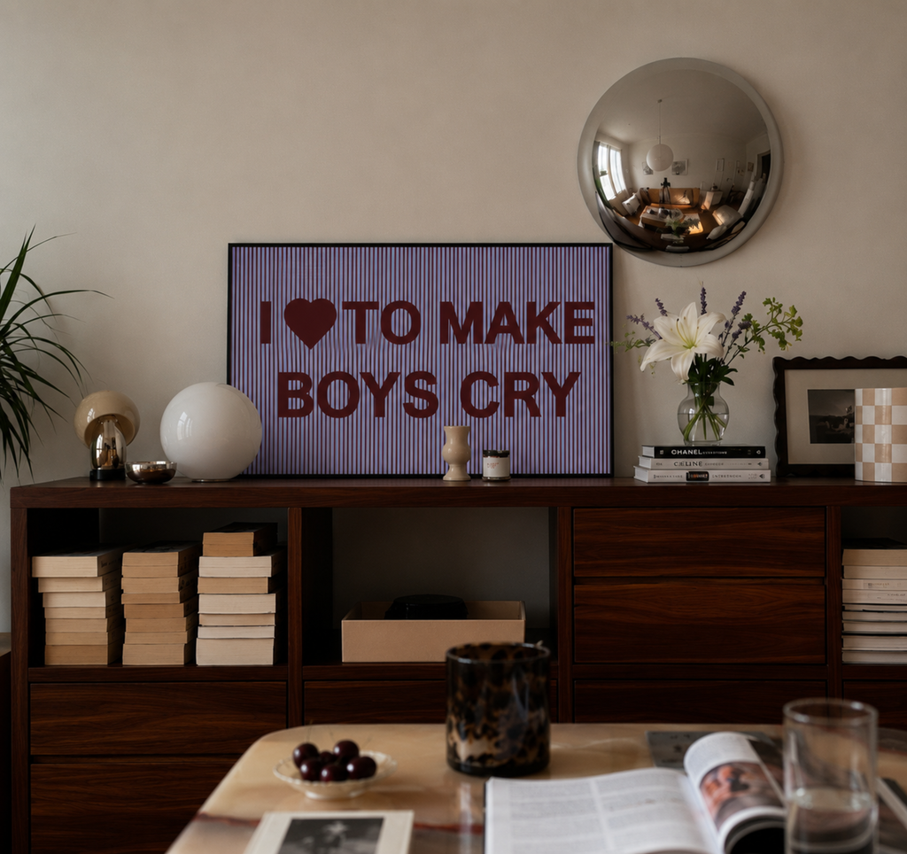 hand drawn Playful Funny typography print with the phrase "I LOVE TO MAKE BOYS CRY" in a retro striped blue and ruby canva. This is a trendy funny typography wall art print ideal for above bed, bedrooms, dorm room decor, living rooms and kitchens, gallery walls and playful interiors. The perfect Cool Girl Apartment decor