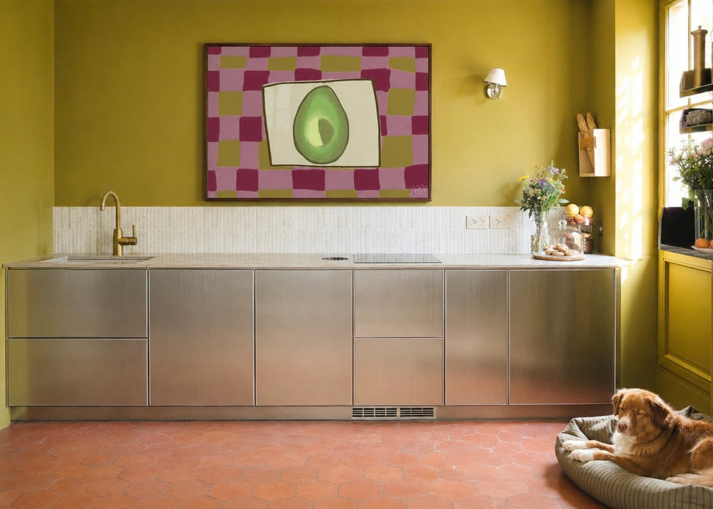 Playful Hand drawn Kitchen wall art with a still life avocado illustration on a pink purple and olive green checkerboard pattern background. This is a hand drawn Oil Painting kitchen and bar cart art Print decor for playful kitchens, dining spaces and eclectic interiors.
