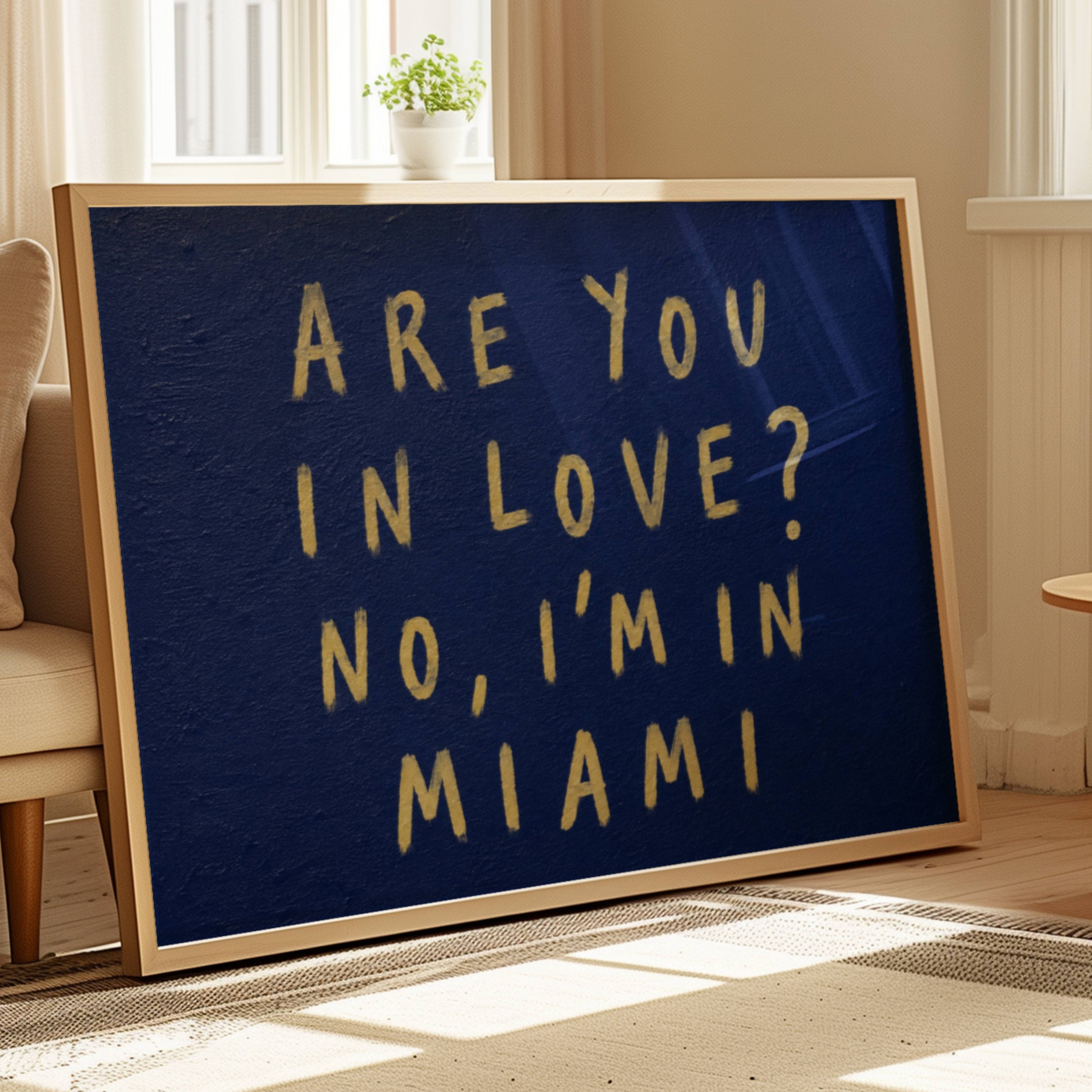 hand drawn trendy location / city  typography print in grafitti style with the quote "ARE YOU IN LOVE? NO, IM IN MIAMI" in a textured canva. This is a trendy minimalist typography wall art print ideal for above bed, bedrooms, dorm room decor, living rooms and kitchens, gallery walls and playful interiors. The perfect Cool Girl Apartment decor