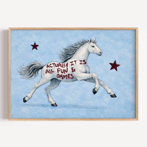 A surreal Symbolic artwork featuring a White Horse running against a pale blue background with Burgundy stars. The Horse has handwritten quote "Actually It Is All Fun and Games". This is a hand drawn Contemporary Folk art Print Oil Painting.