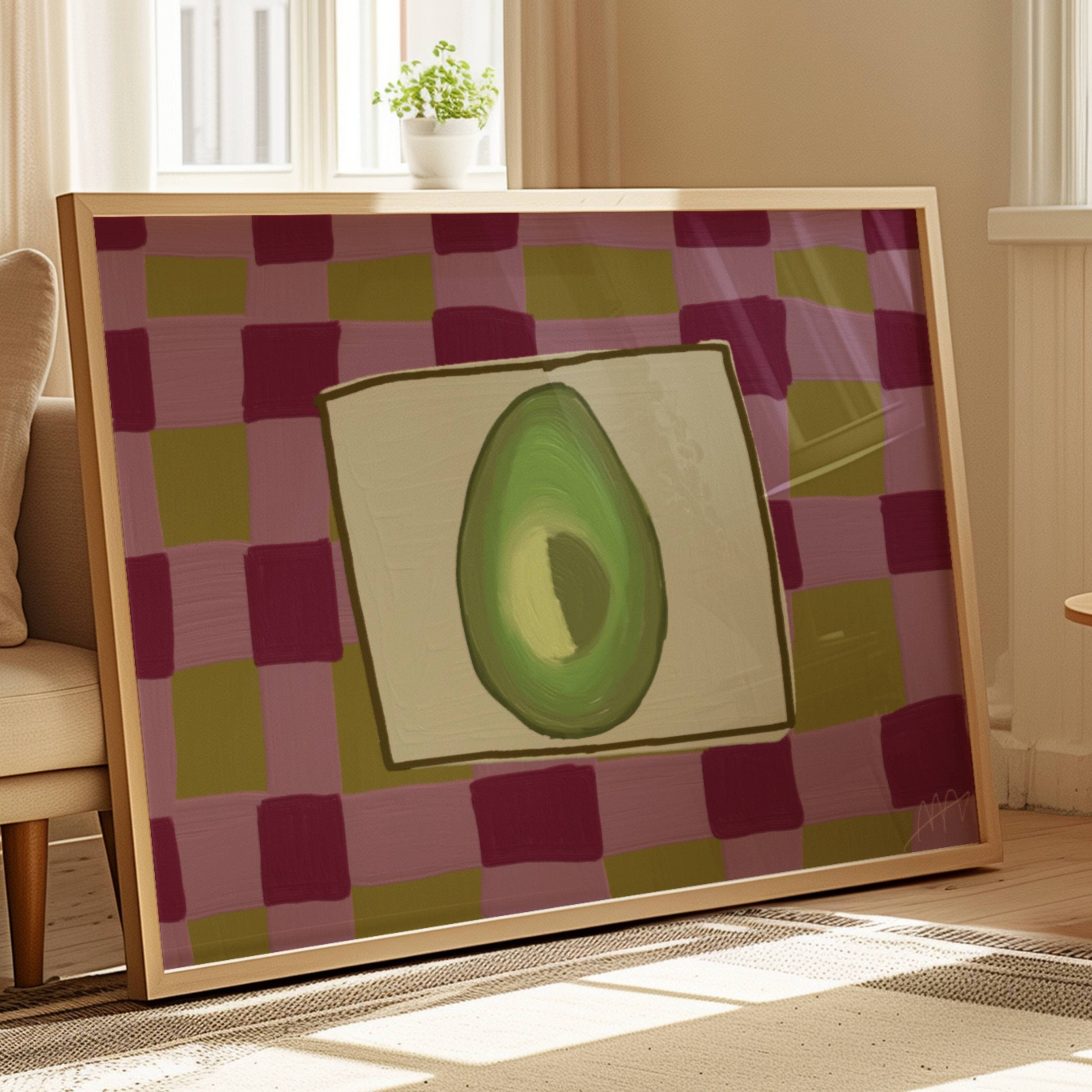 Playful Hand drawn Kitchen wall art with a still life avocado illustration on a pink purple and olive green checkerboard pattern background. This is a hand drawn Oil Painting kitchen and bar cart art Print decor for playful kitchens, dining spaces and eclectic interiors.