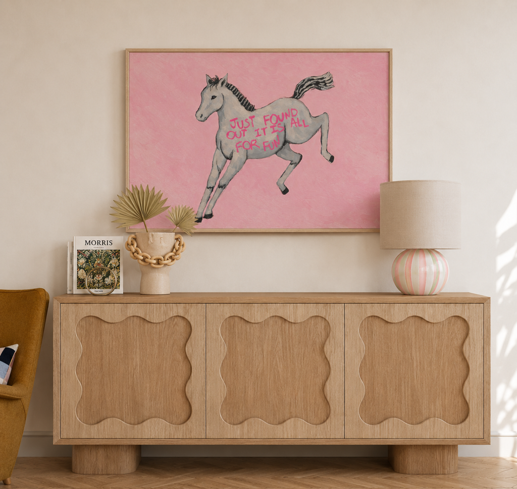 A surreal Symbolic artwork featuring a White Horse running against a pink background. The Horse has handwritten quote "Just Found Out It Is All For Fun". This is a hand drawn Eclectic Contemporary Folk art Print Oil Painting.