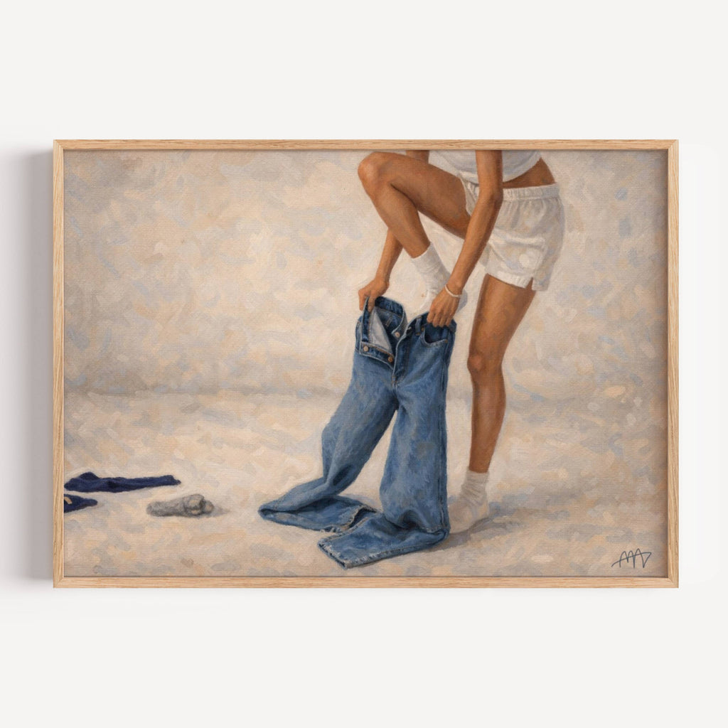blue jeans is a hand painted Contemporary and figurative feminine wall art print featuring a woman dressing in jeans, exploring femininity, intimacy and quiet daily rituals, against sandy neutral beige background with expressive painterly texture. Minimalist Mid century modern oil painting in cinematic nostalgia composition.