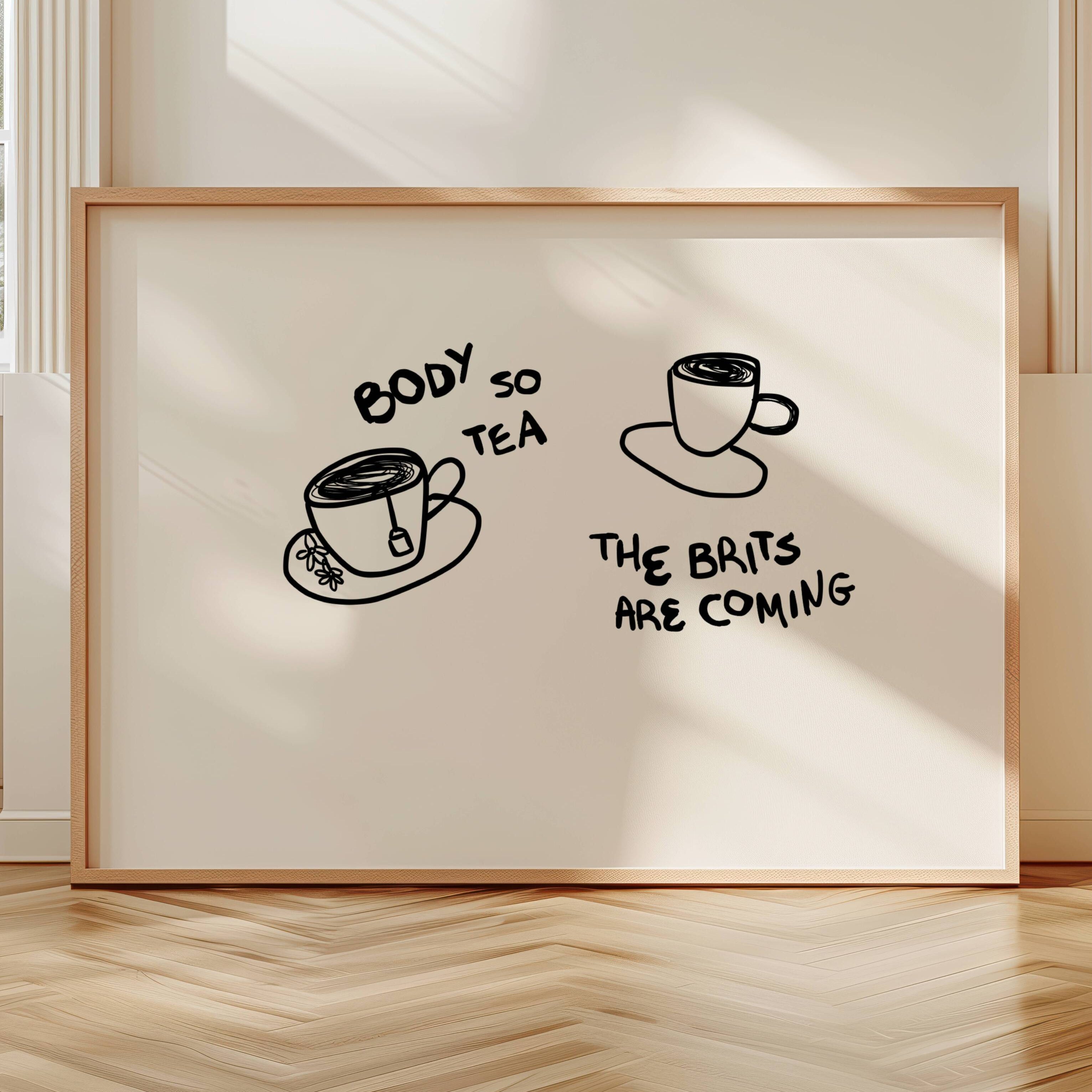 Body so tea the brits are coming is a humorous minimal typography wall art print, with two hand-drawn cups and playful whimsical handwritten lettering, adding charm, humour and effortless character to kitchens, breakfast nooks, dining spaces, coffee stations and tea corners, a conversation piece Inspired by café culture, slow mornings, blending contemporary minimalism with playful illustration