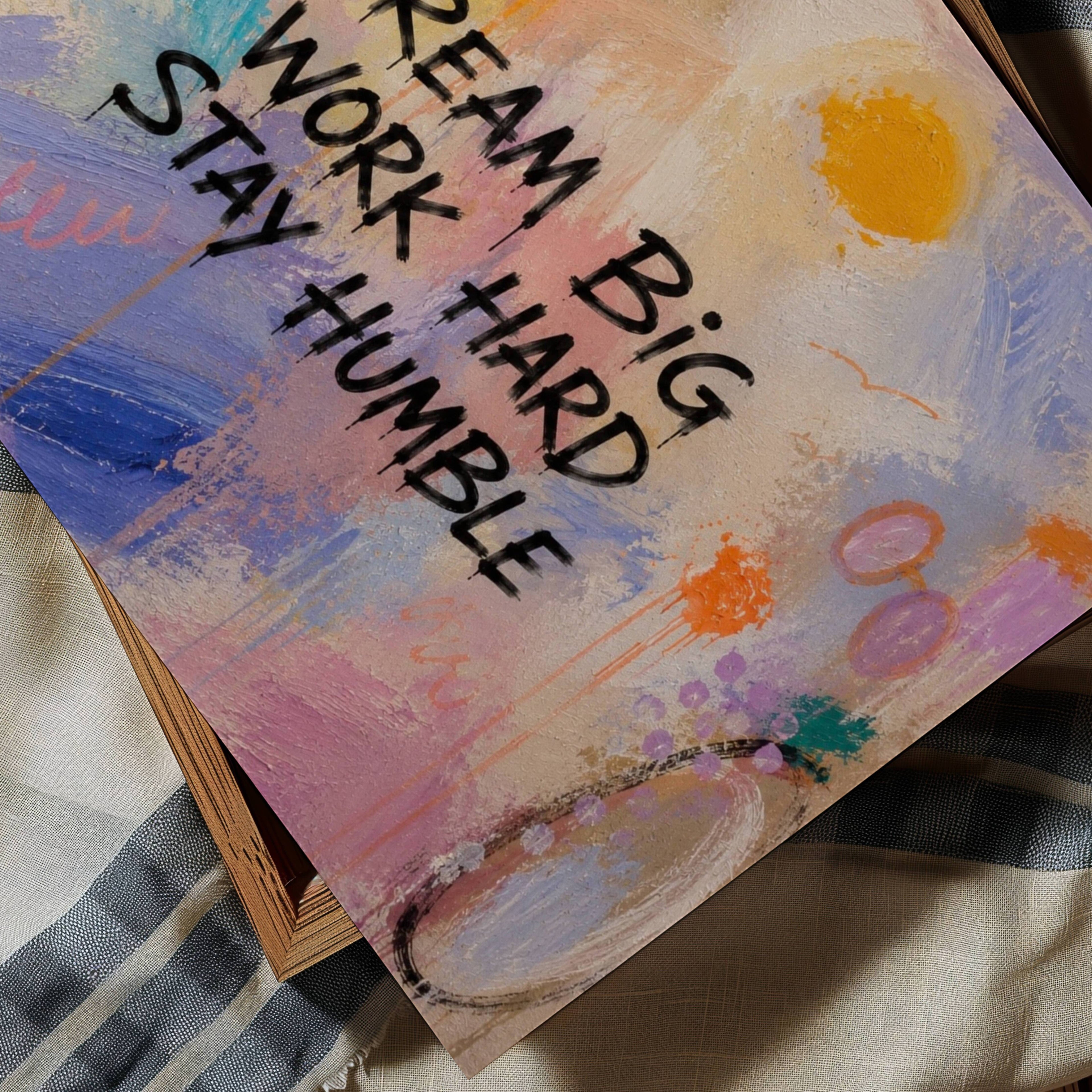 hand drawn Trendy typography abstract print with the motivational quote "DREAM BIG WORK HARD STAY HUMBLE" in a textured abstract painted canva in multiple colors. This is a trendy grafitti style typography wall art print ideal for above bed, bedrooms, dorm room decor, living rooms and kitchens, gallery walls and playful interiors. The perfect Cool Girl Apartment decor