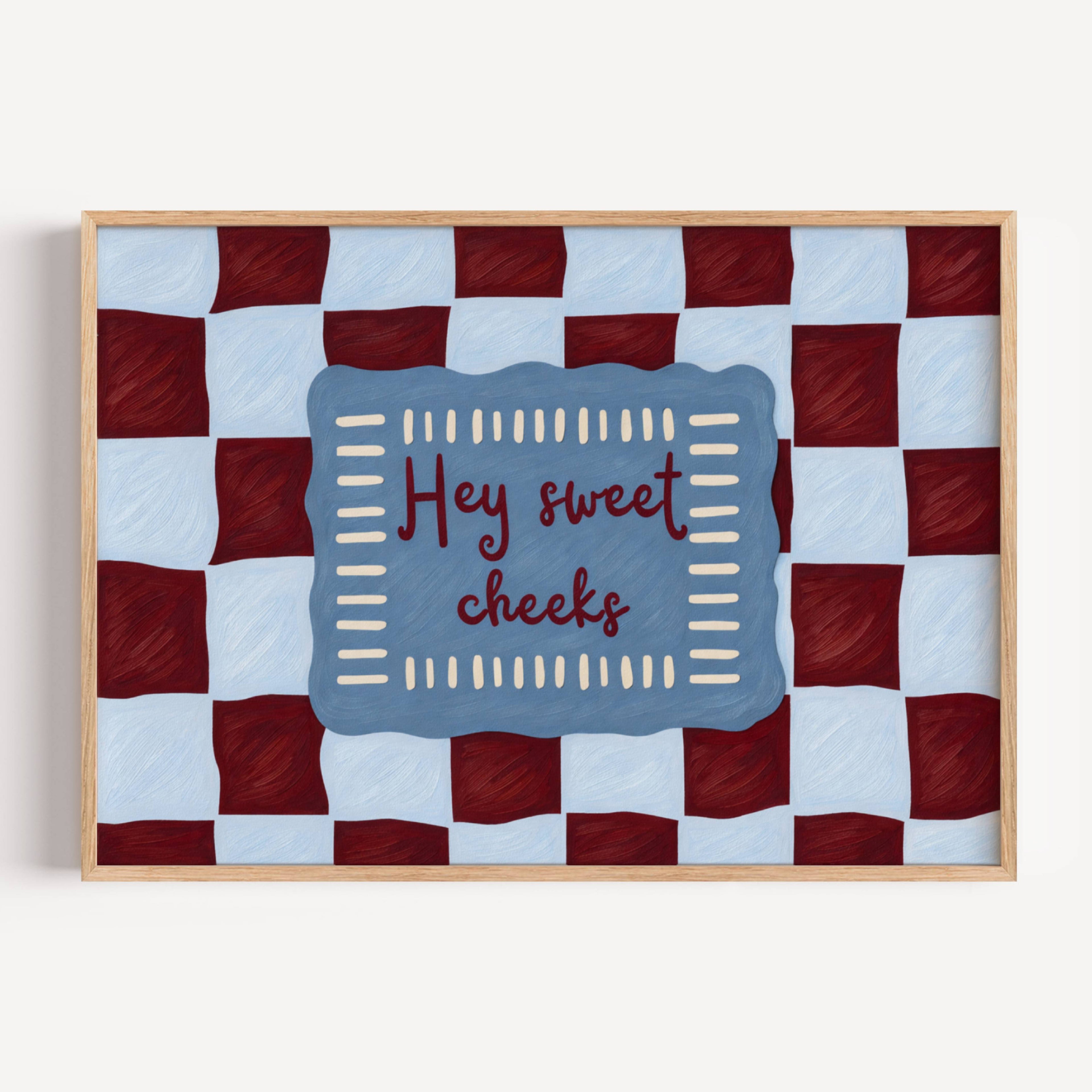 HEY SWEET CHEEKS is a whimsical Retro typography art print designed to bring humour, colour and personality into your bathroom and laundry room. Featuring vintage-inspired Checkered patterns and hand-lettered typography, this artwork captures the nostalgic charm while adding a playful decorative touch to modern interiors. this is a hand drawn Retro quote wall art, ideal for bathrooms, laundry room decor, and cheeky playful interiors. blue burgundy