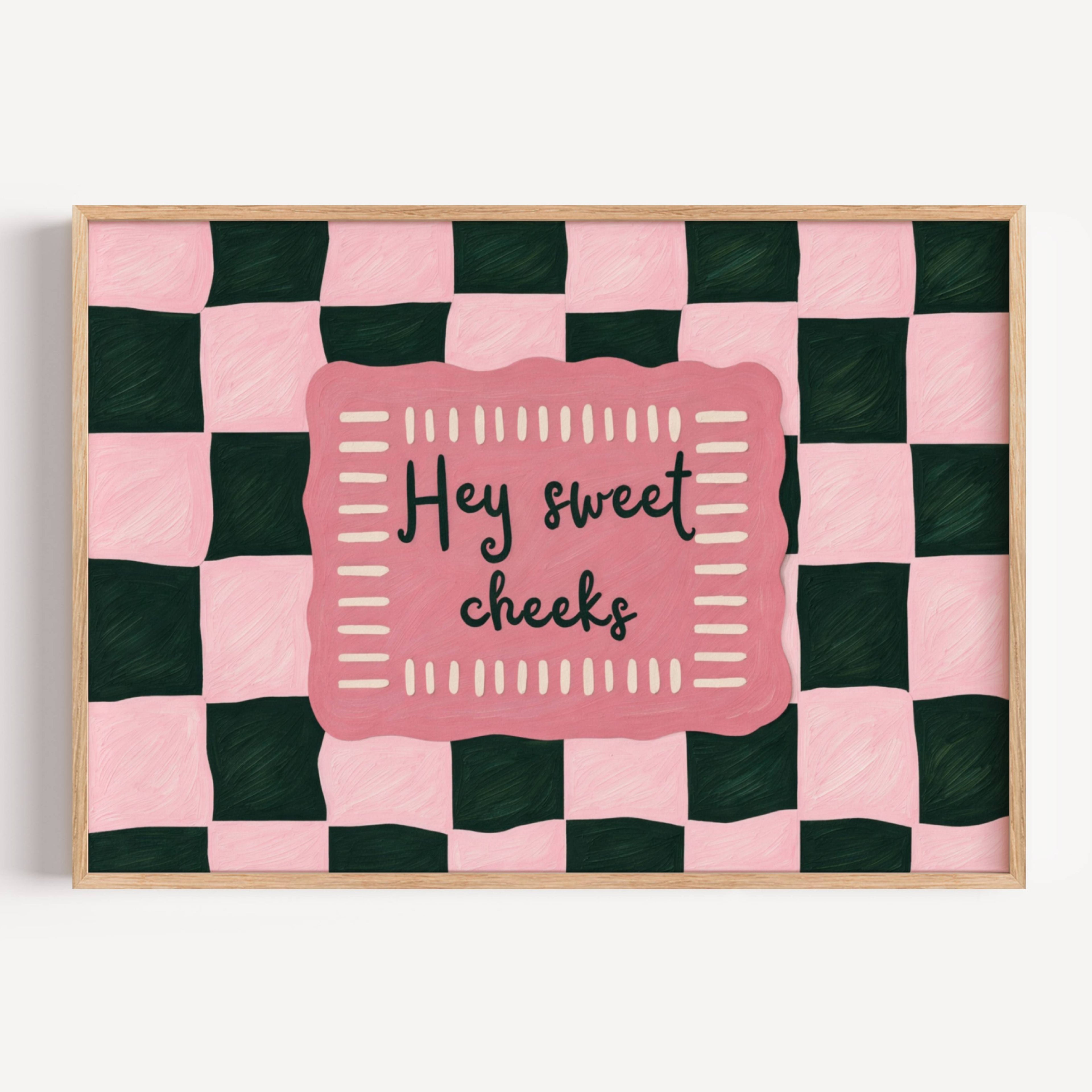 HEY SWEET CHEEKS is a whimsical Retro typography art print designed to bring humour, colour and personality into your bathroom and laundry room. Featuring vintage-inspired Checkered patterns and hand-lettered typography, this artwork captures the nostalgic charm while adding a playful decorative touch to modern interiors. this is a hand drawn Retro quote wall art, ideal for bathrooms, laundry room decor, and cheeky playful interiors. pink green
