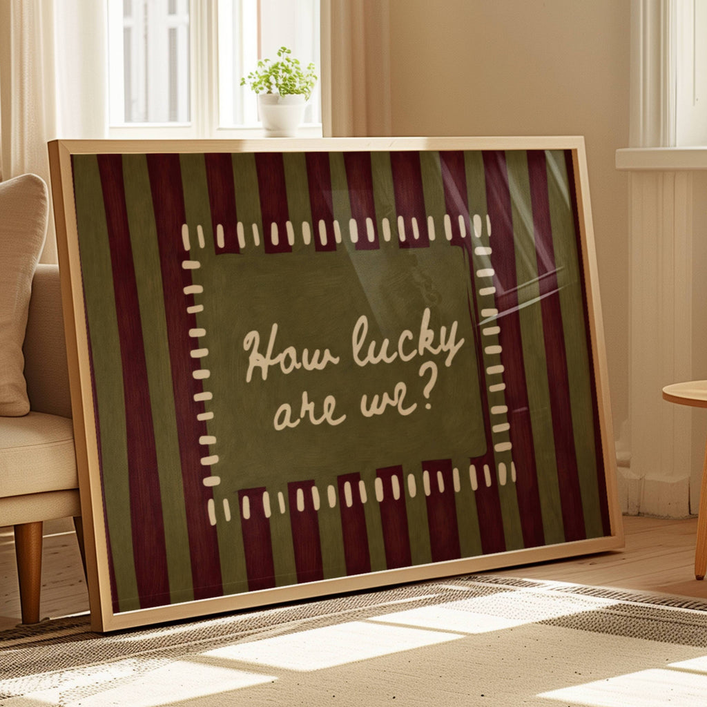 hand drawn Playful typography print with the phrase "How Lucky Are We?" on a khaki and ruby burgundy striped background. This is a hand drawn trendy typography wall art print ideal for bedrooms, dorm room decor, gallery walls and playful interiors.