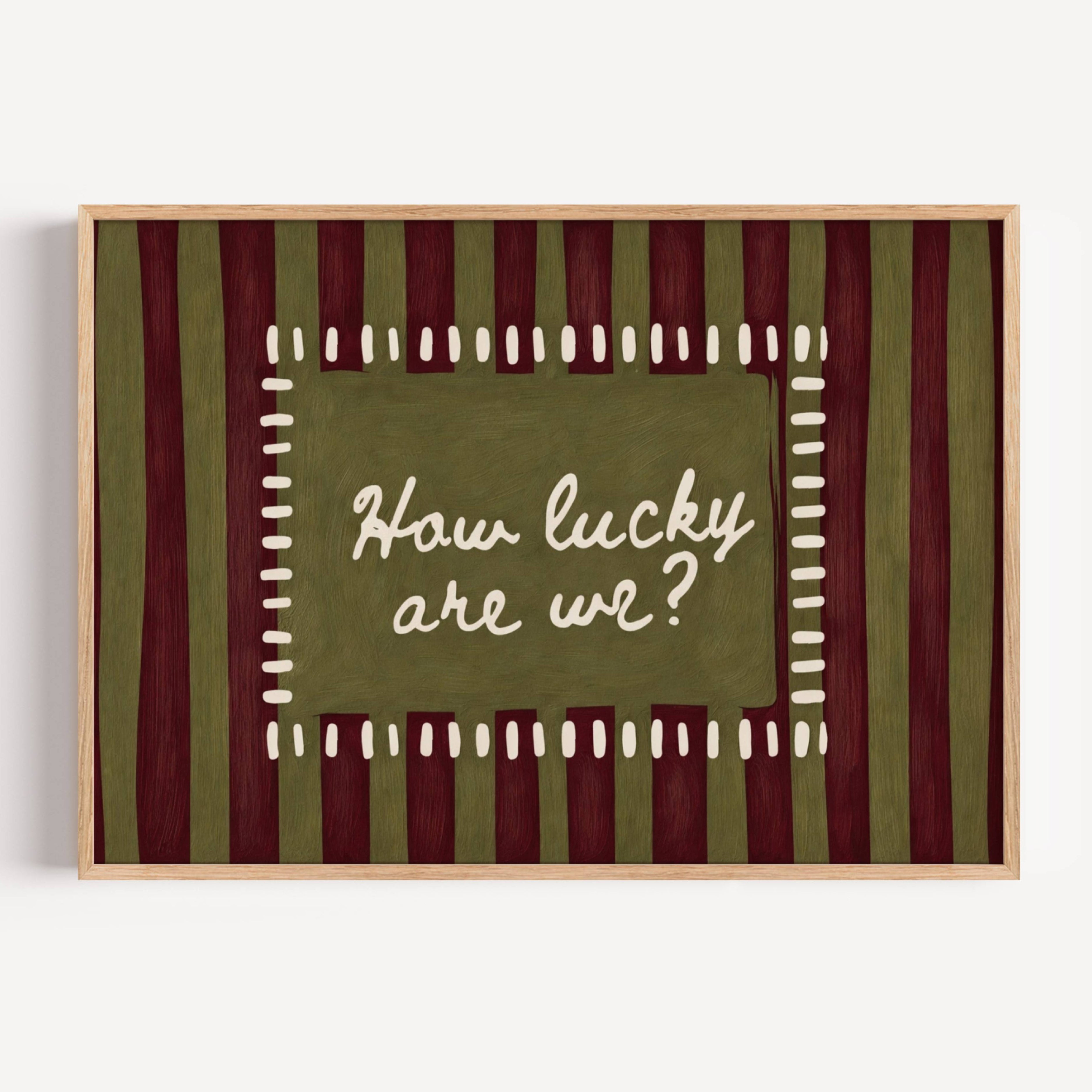hand drawn Playful typography print with the phrase "How Lucky Are We?" on a khaki and ruby burgundy striped background. This is a hand drawn trendy typography wall art print ideal for bedrooms, dorm room decor, gallery walls and playful interiors.