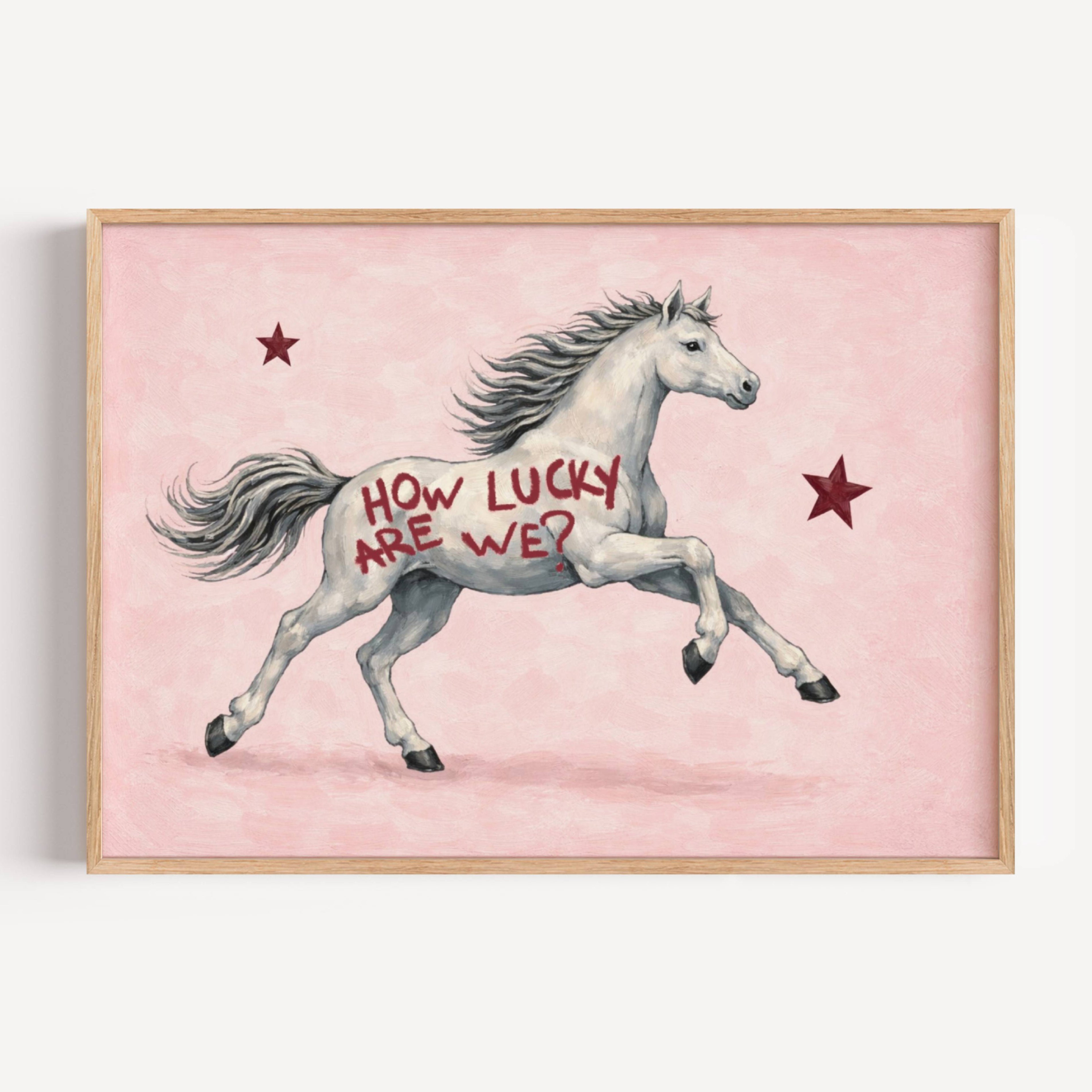Symbolic Eclectic White Horse with red stars and handwritten quote "How Lucky Are We?" on a soft pink background. This is a hand drawn Contemporary Folk art Print Oil Painting.