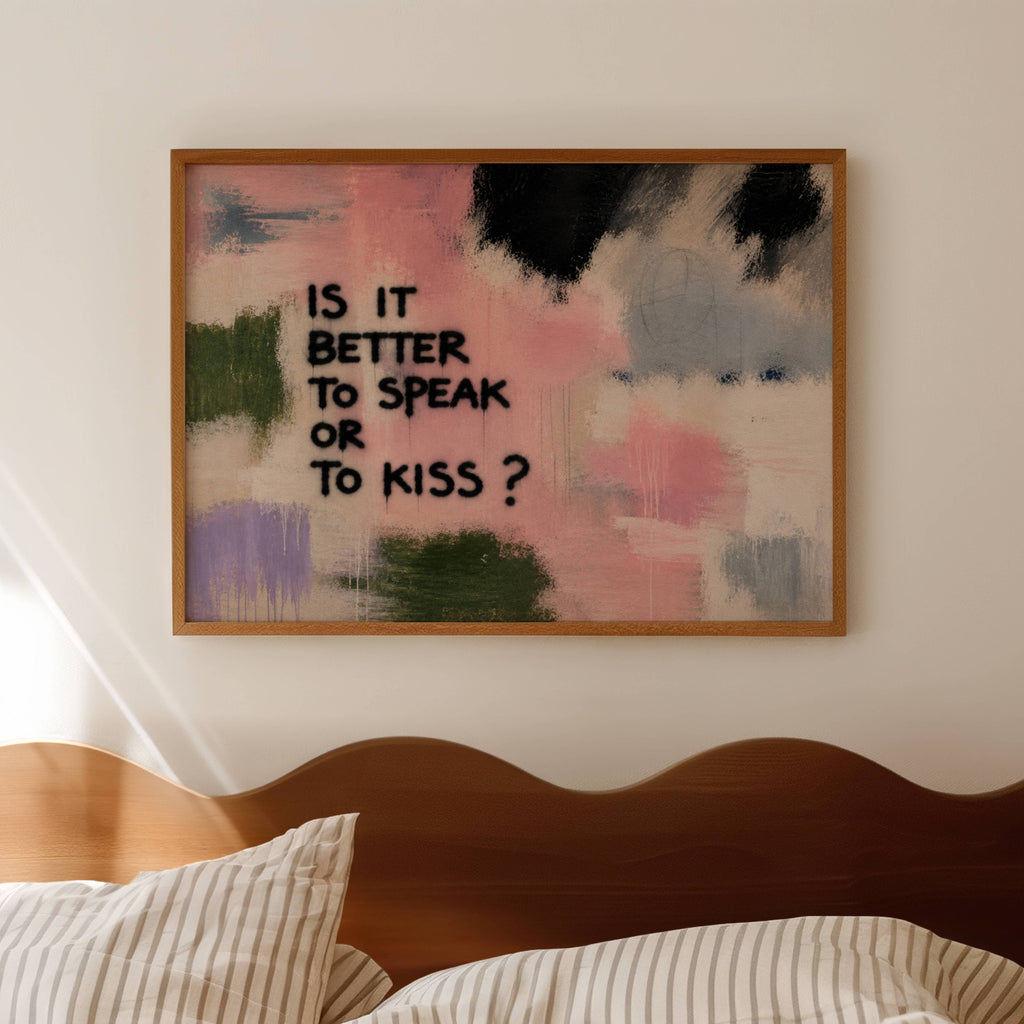 hand drawn Trendy typography abstract print with the motivational quote "IS IT BETTER TO SPEAK OR TO KISS" in a textured abstract painted canva in pink colors. This is a trendy grafitti style typography wall art print ideal for above bed, bedrooms, dorm room decor, living rooms and kitchens, gallery walls and playful interiors. The perfect Cool Girl Apartment decor