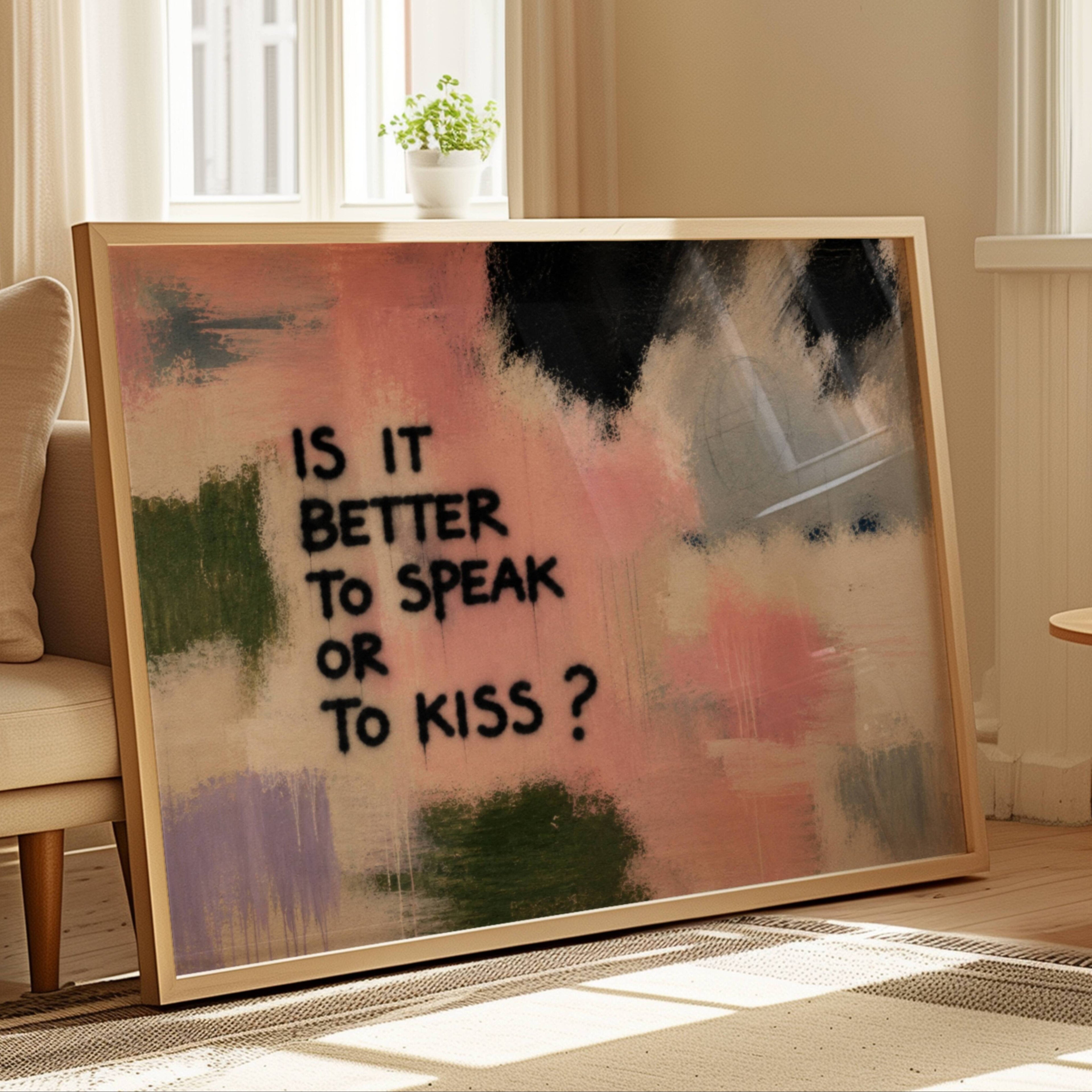 hand drawn Trendy typography abstract print with the motivational quote "IS IT BETTER TO SPEAK OR TO KISS" in a textured abstract painted canva in pink colors. This is a trendy grafitti style typography wall art print ideal for above bed, bedrooms, dorm room decor, living rooms and kitchens, gallery walls and playful interiors. The perfect Cool Girl Apartment decor