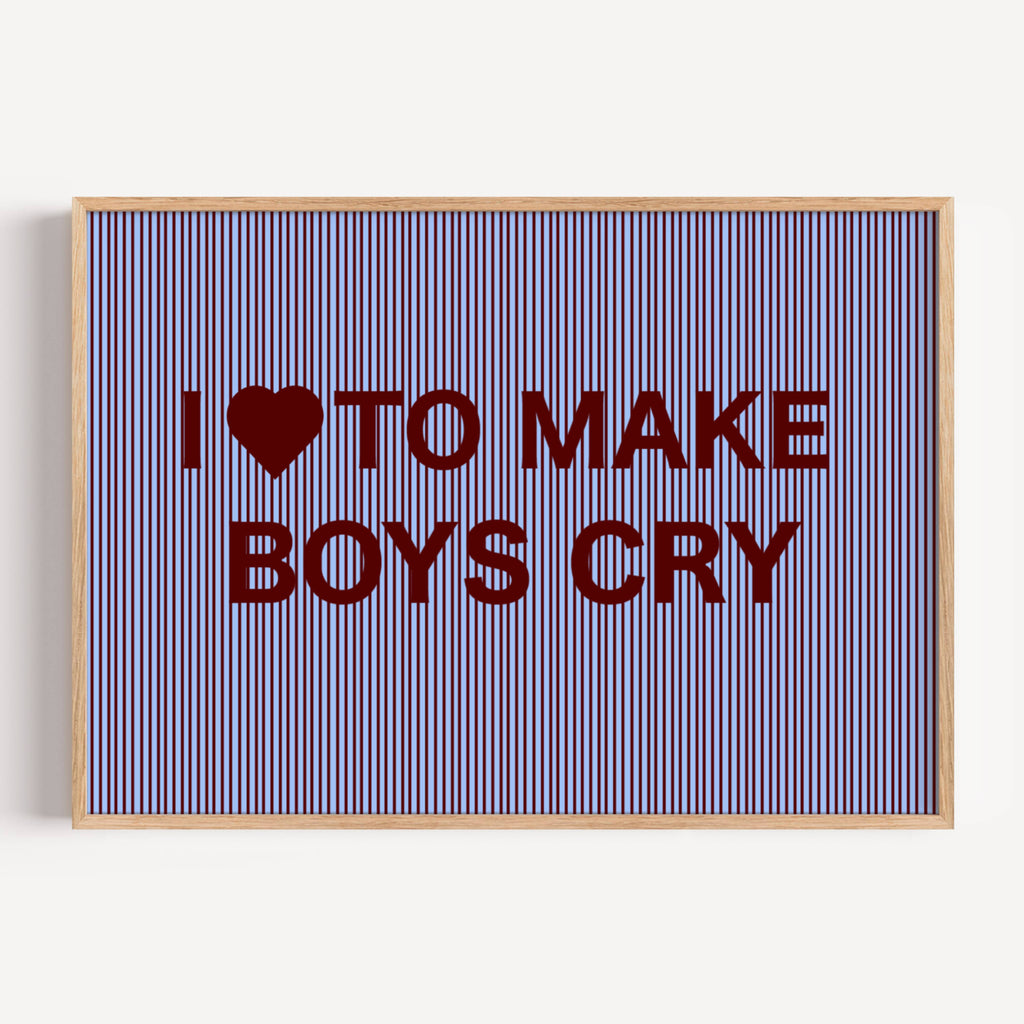 hand drawn Playful Funny typography print with the phrase "I LOVE TO MAKE BOYS CRY" in a retro striped blue and ruby canva. This is a trendy funny typography wall art print ideal for above bed, bedrooms, dorm room decor, living rooms and kitchens, gallery walls and playful interiors. The perfect Cool Girl Apartment decor