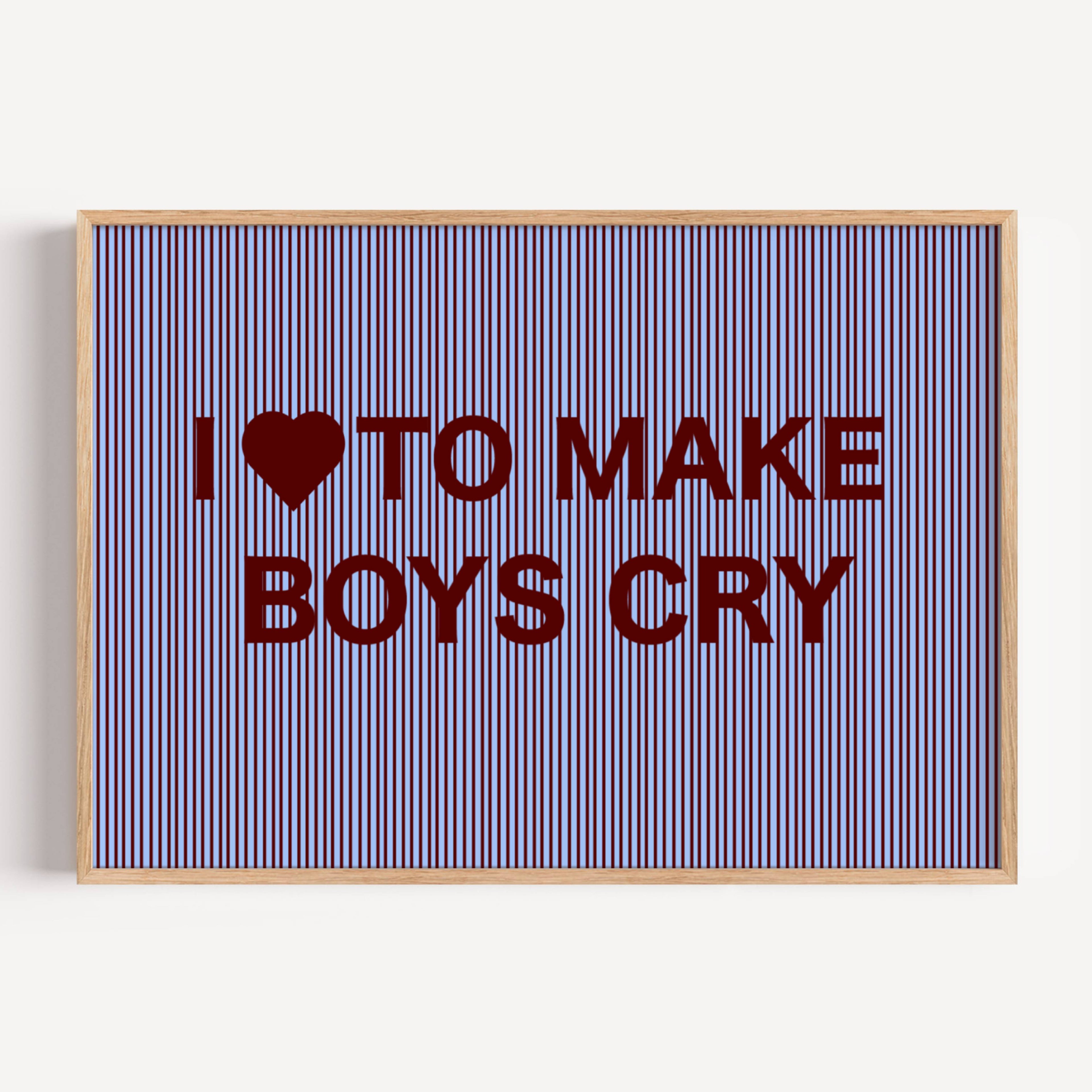 hand drawn Playful Funny typography print with the phrase "I LOVE TO MAKE BOYS CRY" in a retro striped blue and ruby canva. This is a trendy funny typography wall art print ideal for above bed, bedrooms, dorm room decor, living rooms and kitchens, gallery walls and playful interiors. The perfect Cool Girl Apartment decor