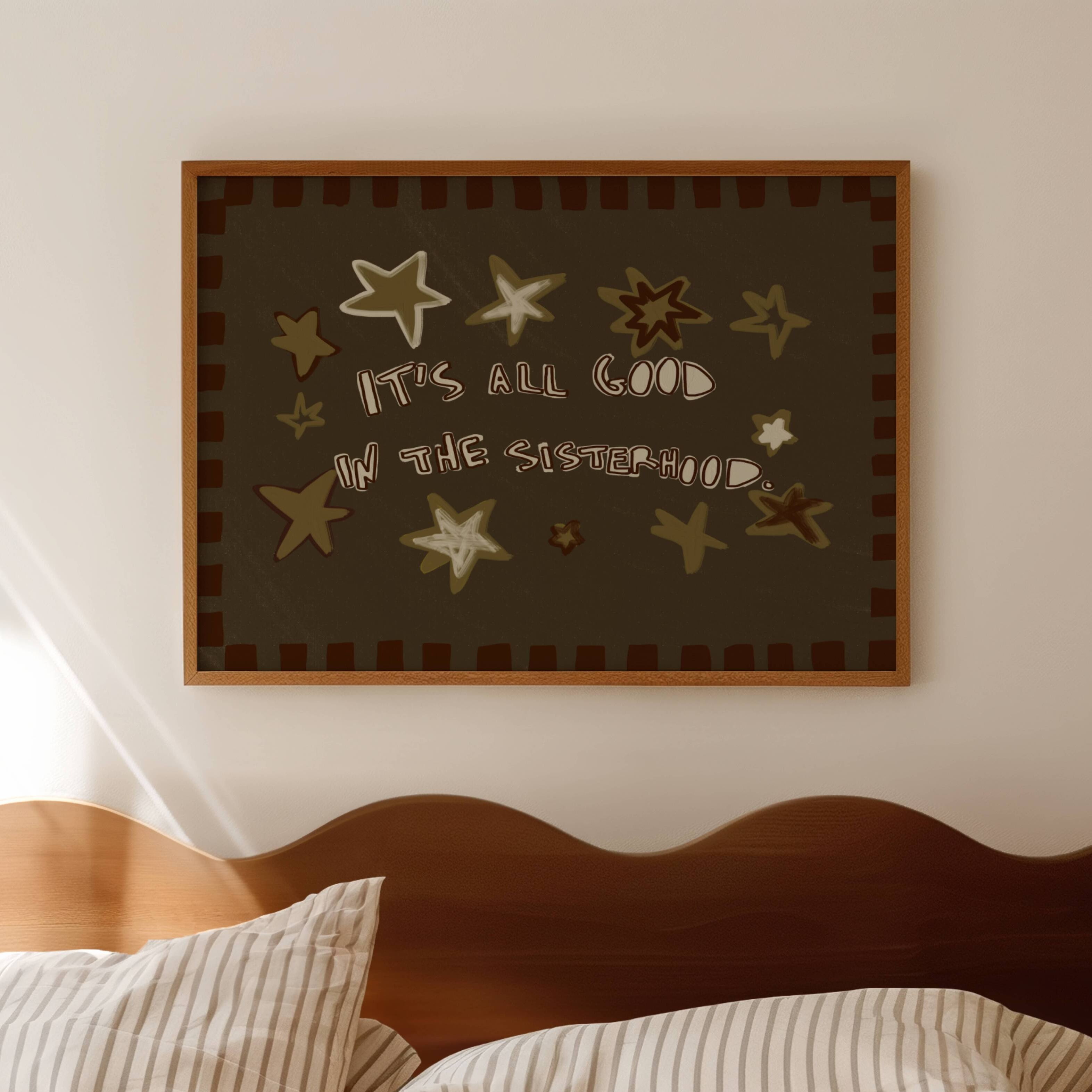 Playful typography print with the phrase "It's all good in the sisterhood" on a khaki background with burgundy stars. This is a hand drawn trendy typography wall art print ideal for girly bedrooms, dorm room decor, sorority houses and gift for your best friend.