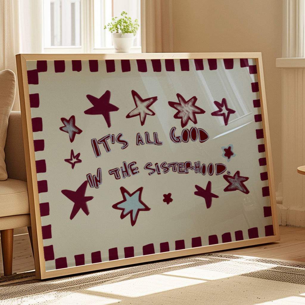 Playful typography print with the phrase "It's all good in the sisterhood" on a blue background with burgundy stars. This is a hand drawn trendy typography wall art print ideal for girly bedrooms, dorm room decor, sorority houses and gift for your best friend.
