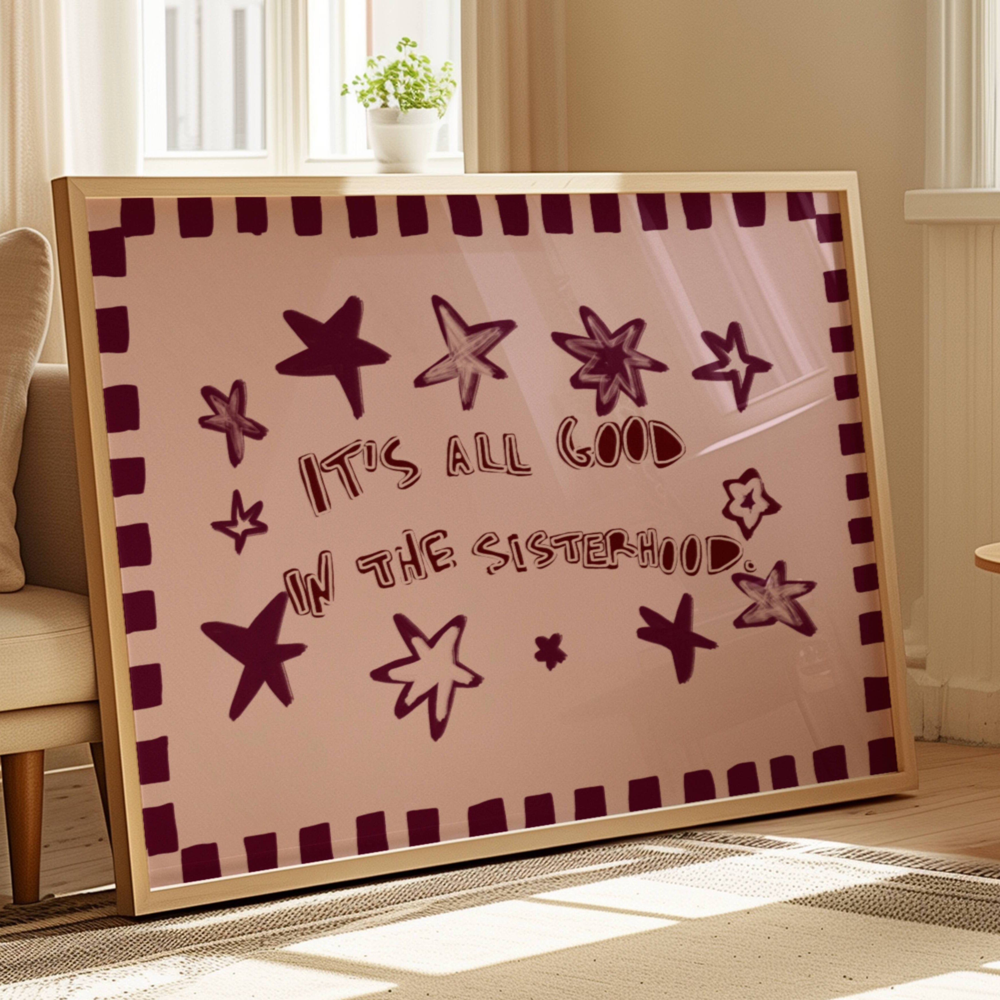Playful typography print with the phrase "It's all good in the sisterhood" on a pink background with burgundy stars. This is a hand drawn trendy typography wall art print ideal for girly bedrooms, dorm room decor, sorority houses and gift for your best friend.