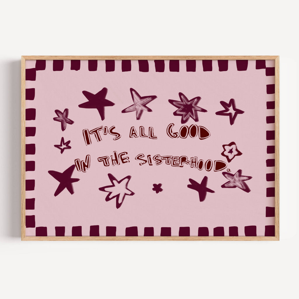 Playful typography print with the phrase "It's all good in the sisterhood" on a pink background with burgundy stars. This is a hand drawn trendy typography wall art print ideal for girly bedrooms, dorm room decor, sorority houses and gift for your best friend.
