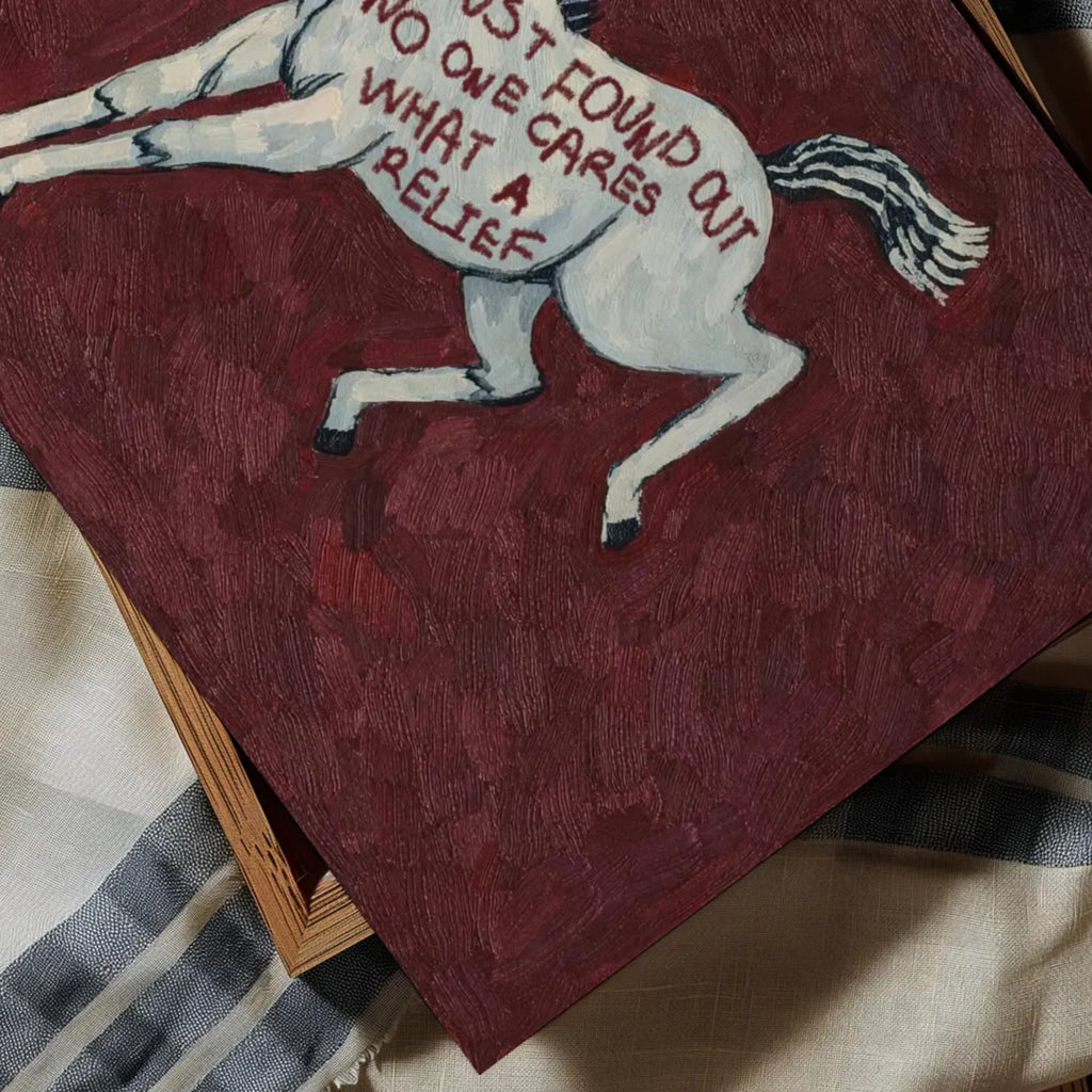 A surreal Symbolic artwork featuring a White Horse running against a burgundy background. The Horse has handwritten quote "Just Found Out No One Cares What A Relief". This is a hand drawn Eclectic Contemporary Folk art Print Oil Painting.