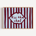 Playful Kitchen Funny Typography wall art with Handwritten quote "Kiss the chef" on a retro striped background in ruby blue tones with lips motif. This is a hand drawn Oil Painting kitchen art Print decor.