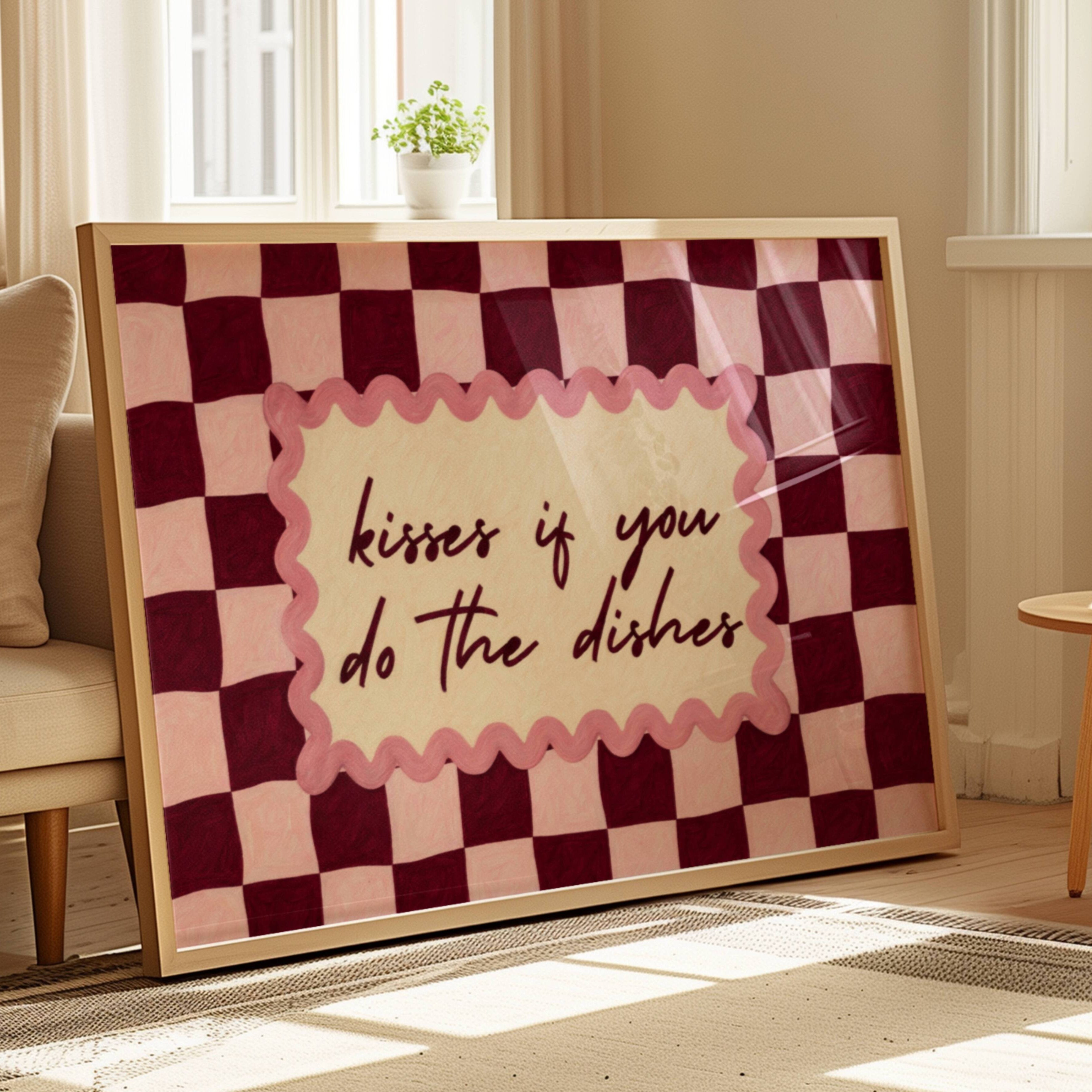 Playful Kitchen Funny Typography wall art with Handwritten quote "Kisses if you do the dishes" on a retro checkered - checkerboard pattern in pink ruby burgundy tones. This is a hand drawn Oil Painting kitchen art Print decor.