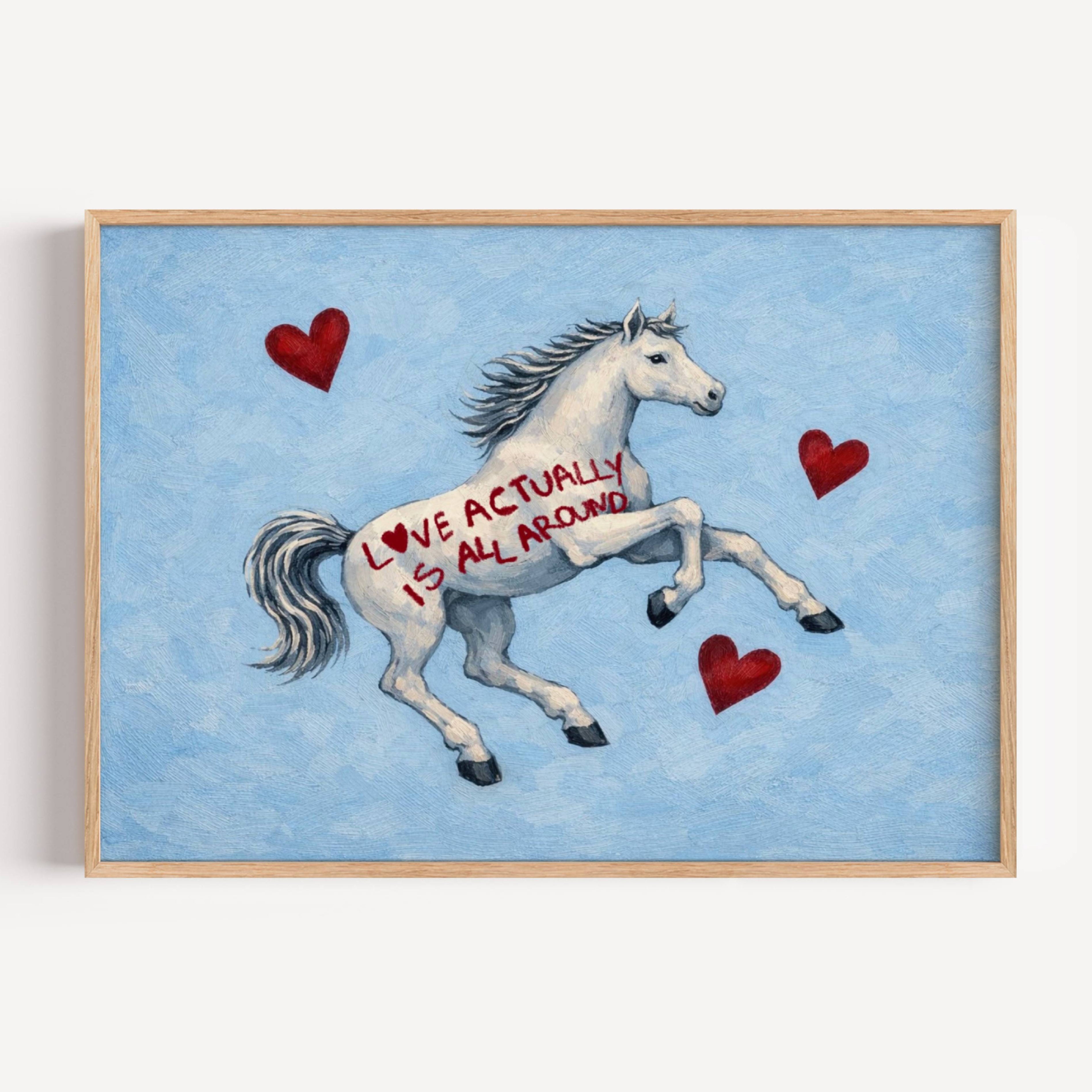 Symbolic Eclectic White Horse with red hearts and handwritten quote "Love Actually is All Around" on a soft blue background. This is a hand drawn Contemporary Folk art Print Oil Painting