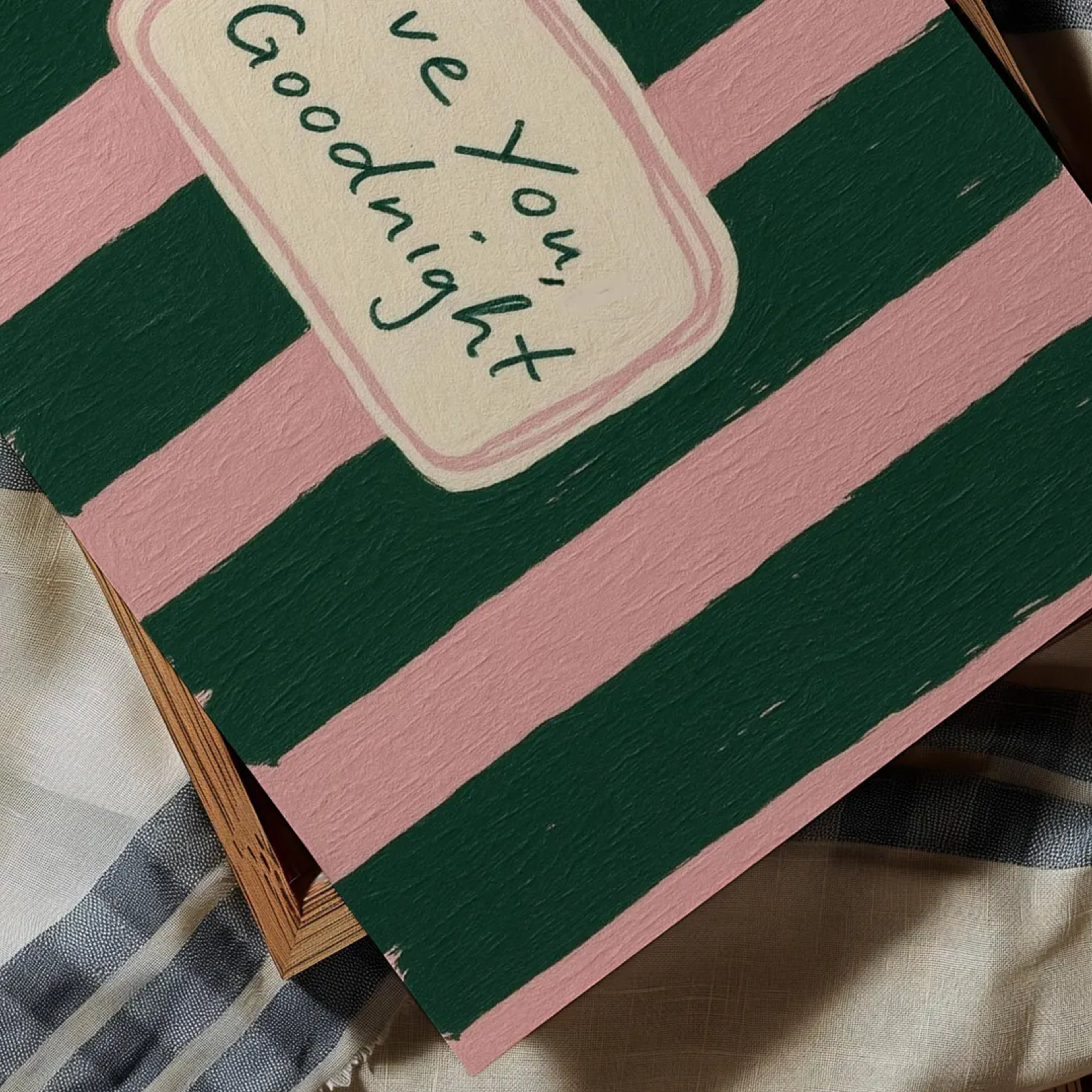 hand drawn Playful typography print with the phrase "Love You Goodnight" on a retro pink green striped background, on textured oil painting canva. This is a hand drawn trendy typography wall art print ideal for bedrooms, dorm room decor, gallery walls and playful interiors.