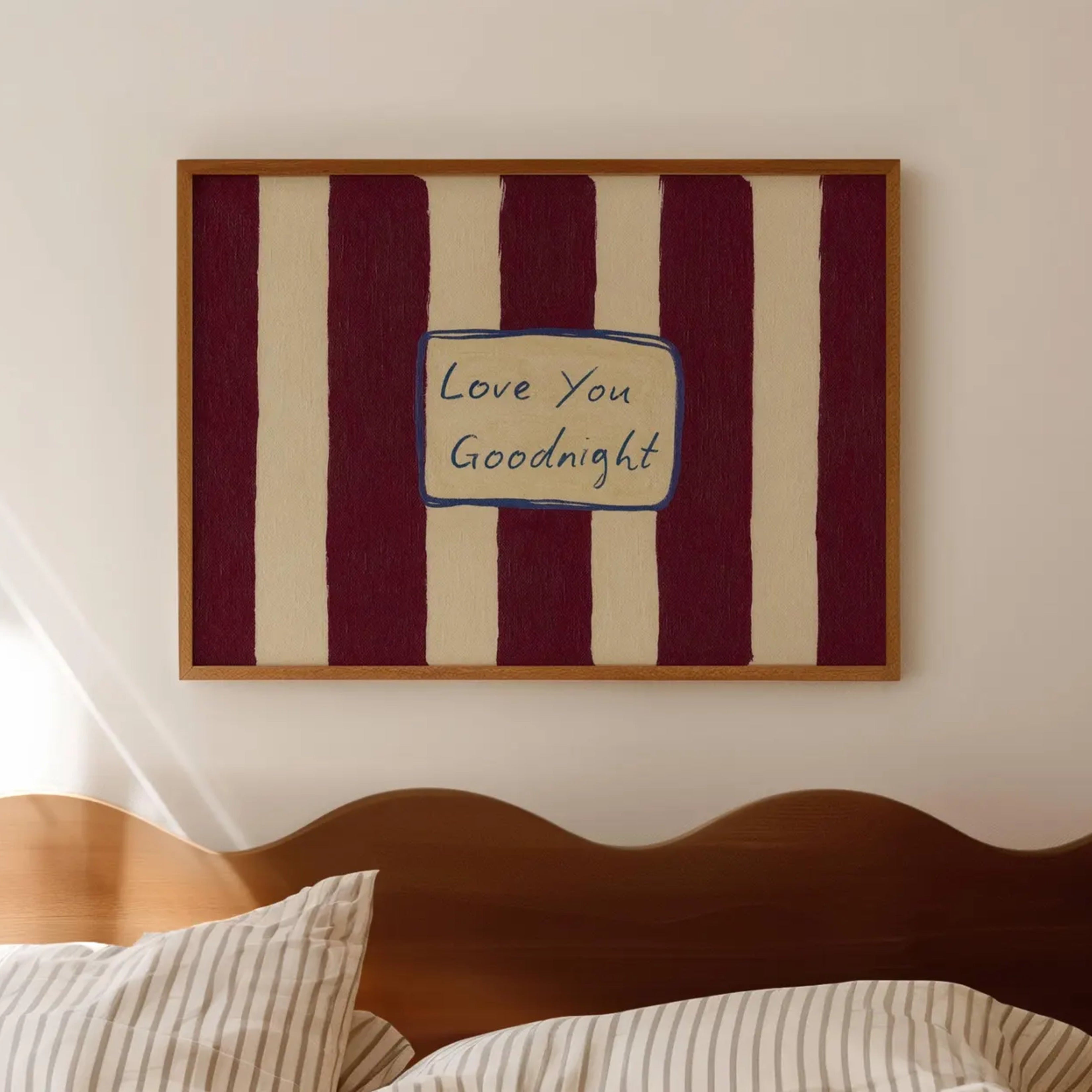 hand drawn Playful typography print with the phrase "Love You Goodnight" on a retro burgundy striped background, on textured oil painting canva. This is a hand drawn trendy typography wall art print ideal for bedrooms, dorm room decor, gallery walls and playful interiors.