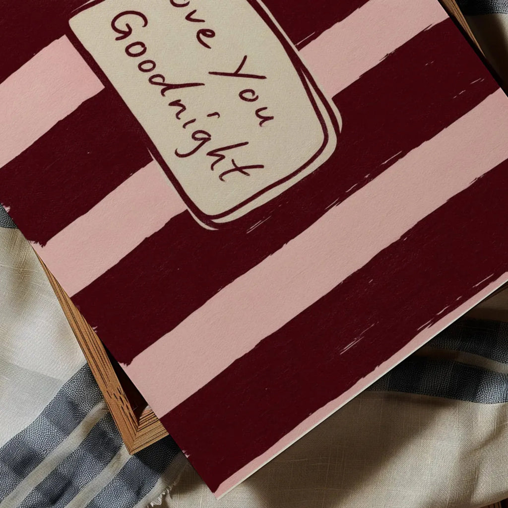 hand drawn Playful typography print with the phrase "Love You Goodnight" on a retro burgundy and pink striped background, on textured oil painting canva. This is a hand drawn trendy typography wall art print ideal for bedrooms, dorm room decor, gallery walls and playful interiors.
