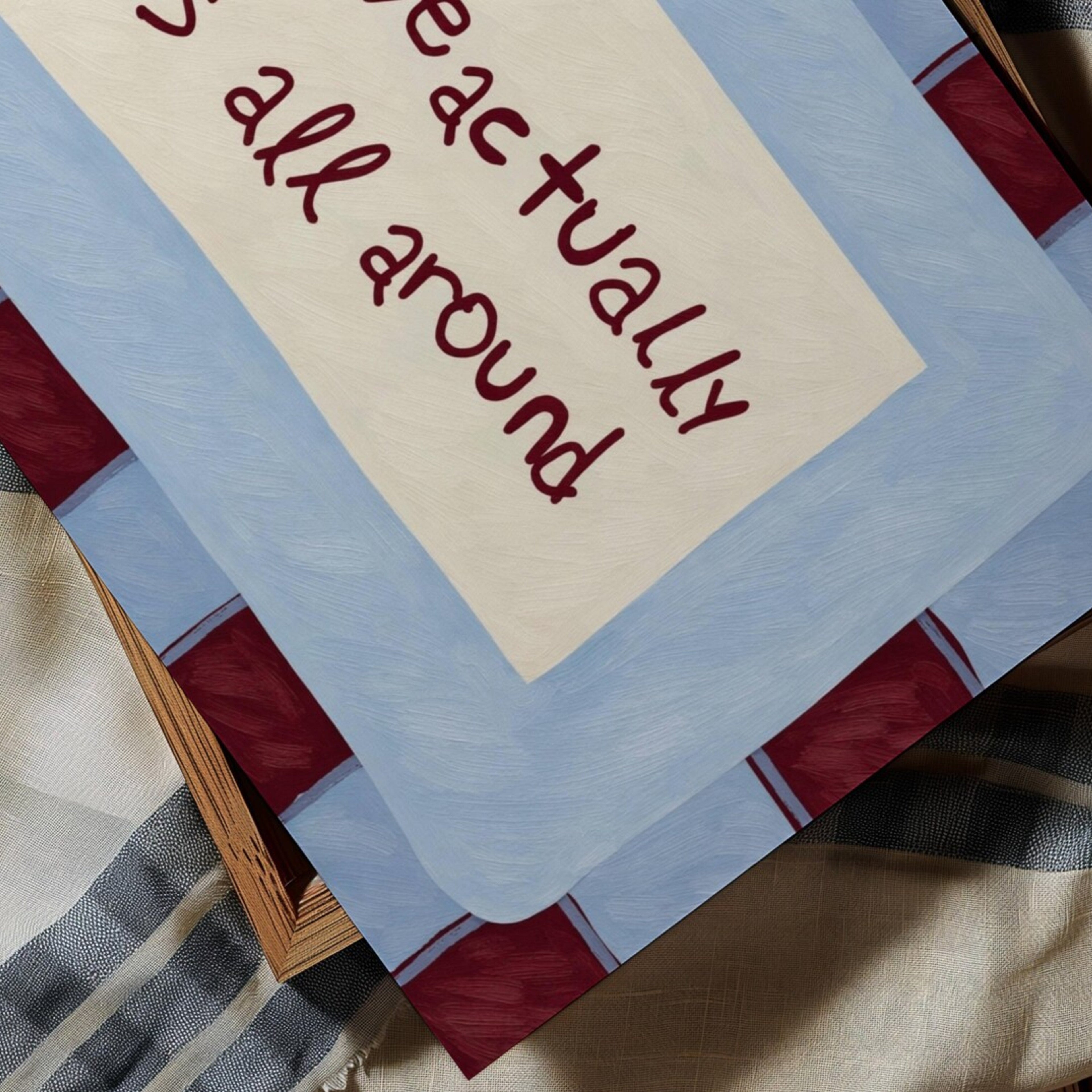hand drawn Playful typography print with the phrase "Love actually is all around" in a retro blue and ruby burgundy, on textured oil painting canva. This is a hand drawn trendy romantic typography wall art print ideal for above bed, bedrooms, dorm room decor, living rooms and kitchens, gallery walls and playful interiors.