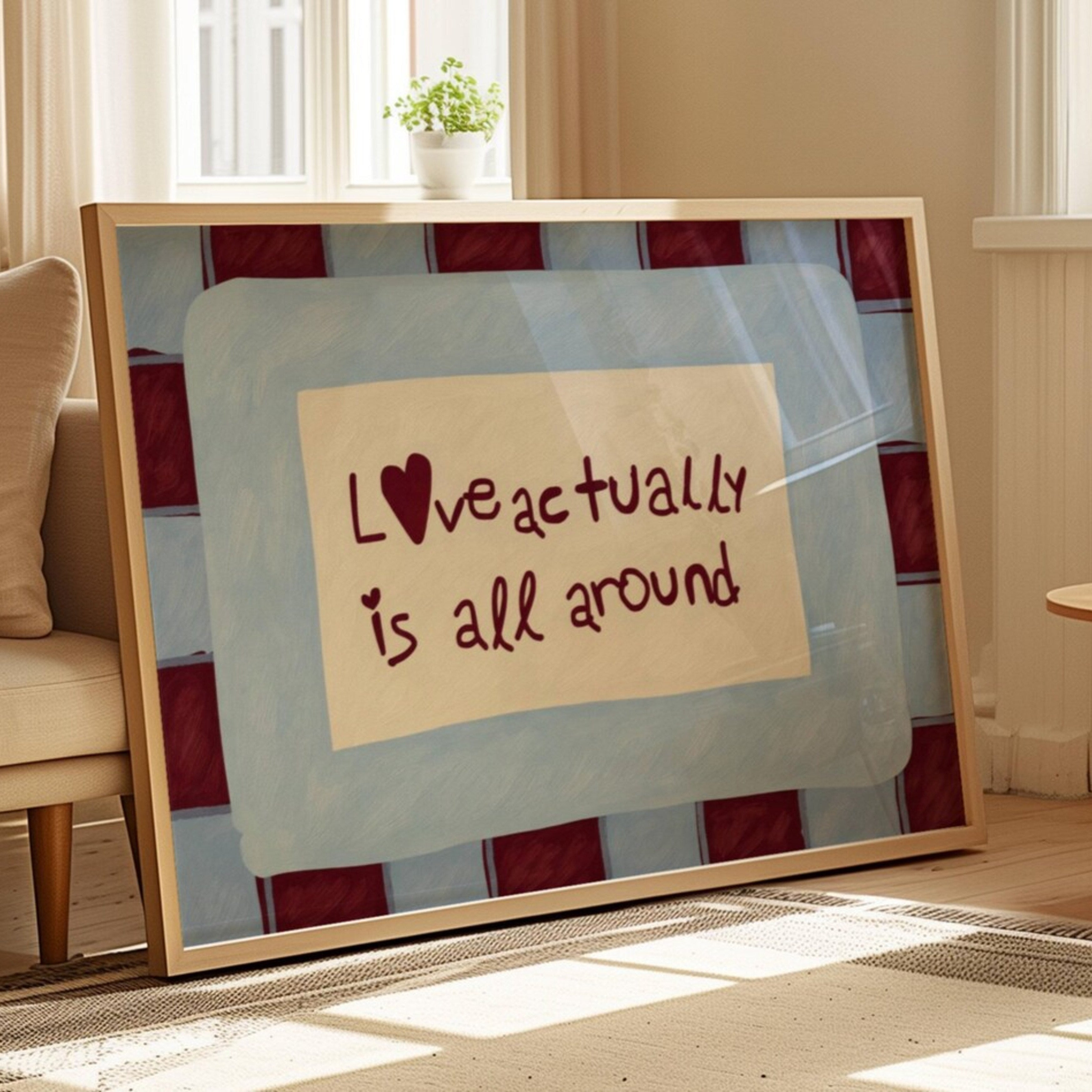 hand drawn Playful typography print with the phrase "Love actually is all around" in a retro blue and ruby burgundy, on textured oil painting canva. This is a hand drawn trendy romantic typography wall art print ideal for above bed, bedrooms, dorm room decor, living rooms and kitchens, gallery walls and playful interiors.