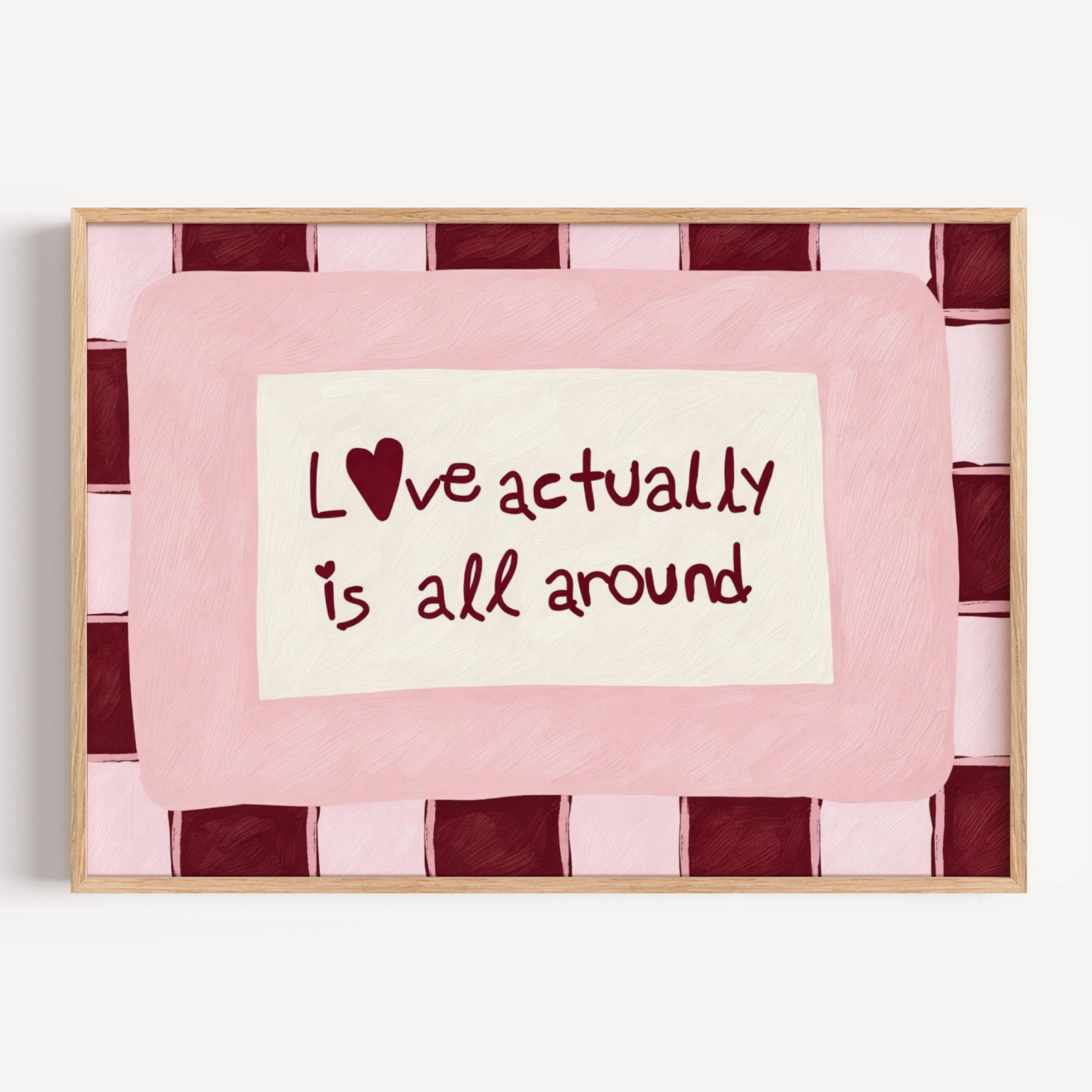 hand drawn Playful typography print with the phrase "Love actually is all around" in a retro pink and ruby burgundy, on textured oil painting canva. This is a hand drawn trendy romantic typography wall art print ideal for above bed, bedrooms, dorm room decor, living rooms and kitchens, gallery walls and playful interiors.