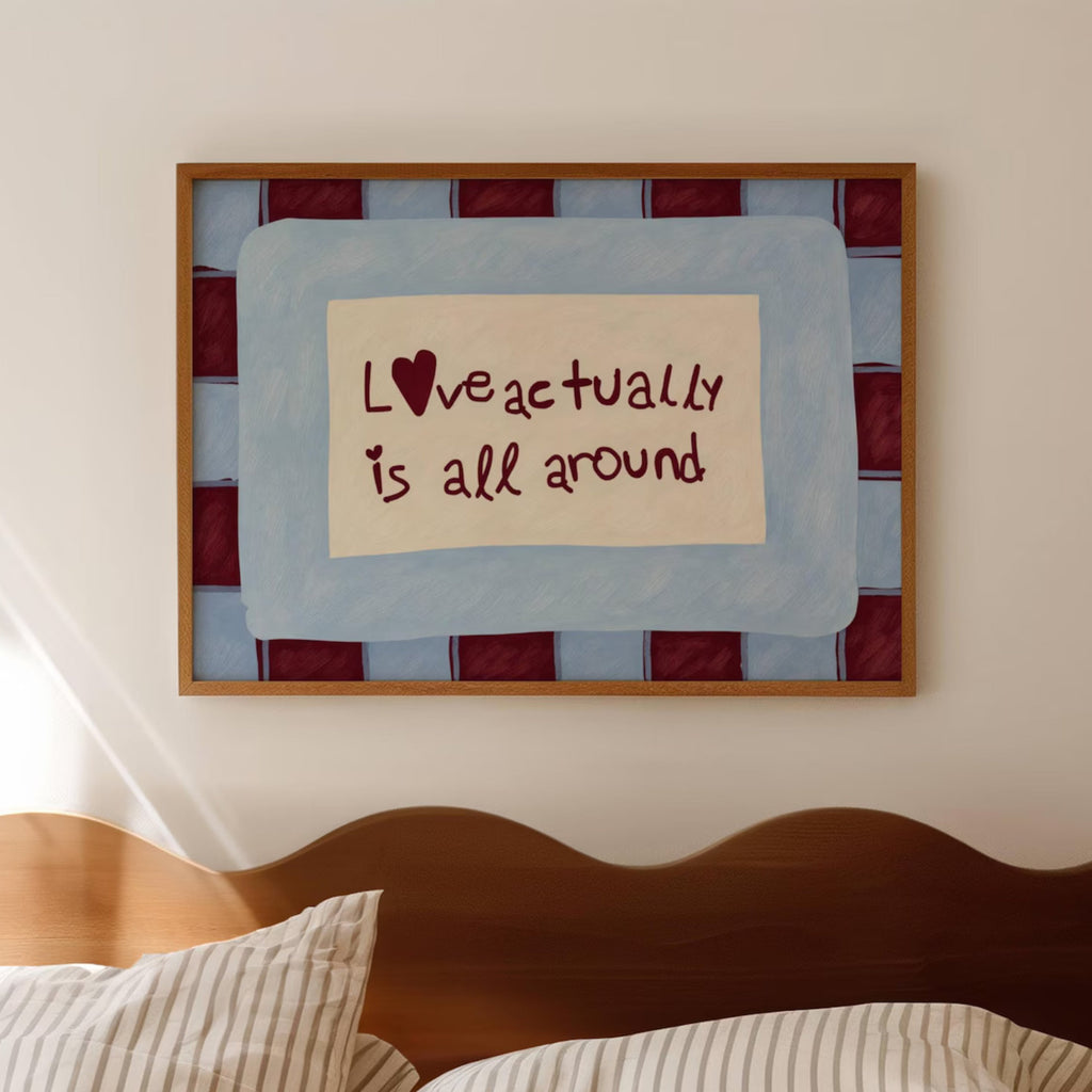 hand drawn Playful typography print with the phrase "Love actually is all around" in a retro blue and ruby burgundy, on textured oil painting canva. This is a hand drawn trendy romantic typography wall art print ideal for above bed, bedrooms, dorm room decor, living rooms and kitchens, gallery walls and playful interiors.
