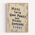 Framed motivational poster with text 'Make Your Own Money and Marry Someone Funny' on a textured beige background.