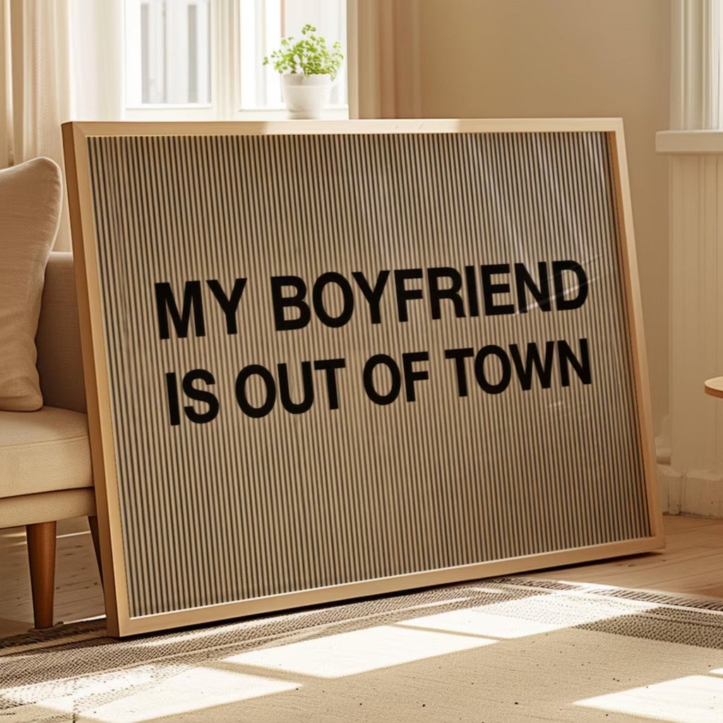 hand drawn Playful Funny typography print with the phrase "MY BOYFRIEND IS OUT OF TOWN" in a retro striped neutral canva. This is a trendy funny typography wall art print ideal for above bed, bedrooms, dorm room decor, living rooms and kitchens, gallery walls and playful interiors. The perfect Cool Girl Apartment decor