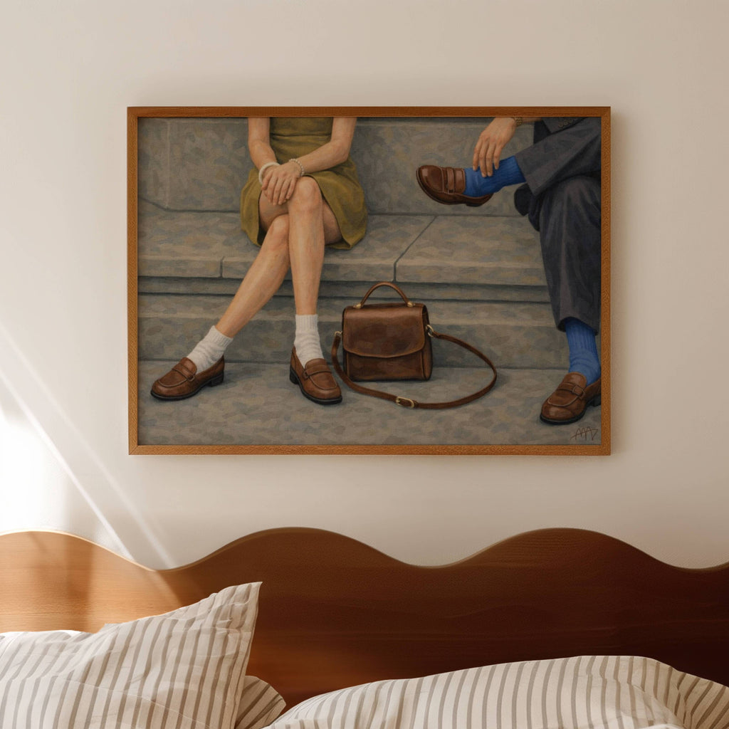 Meet me at the pavement is a hand painted Contemporary and figurative wall art of two seated figures, vintage shoes and a handbag in a nostalgic mid century inspired scene, against a grey background with expressive painterly texture. Minimalist Mid century modern oil painting with loafers in cinematic nostalgia composition.
