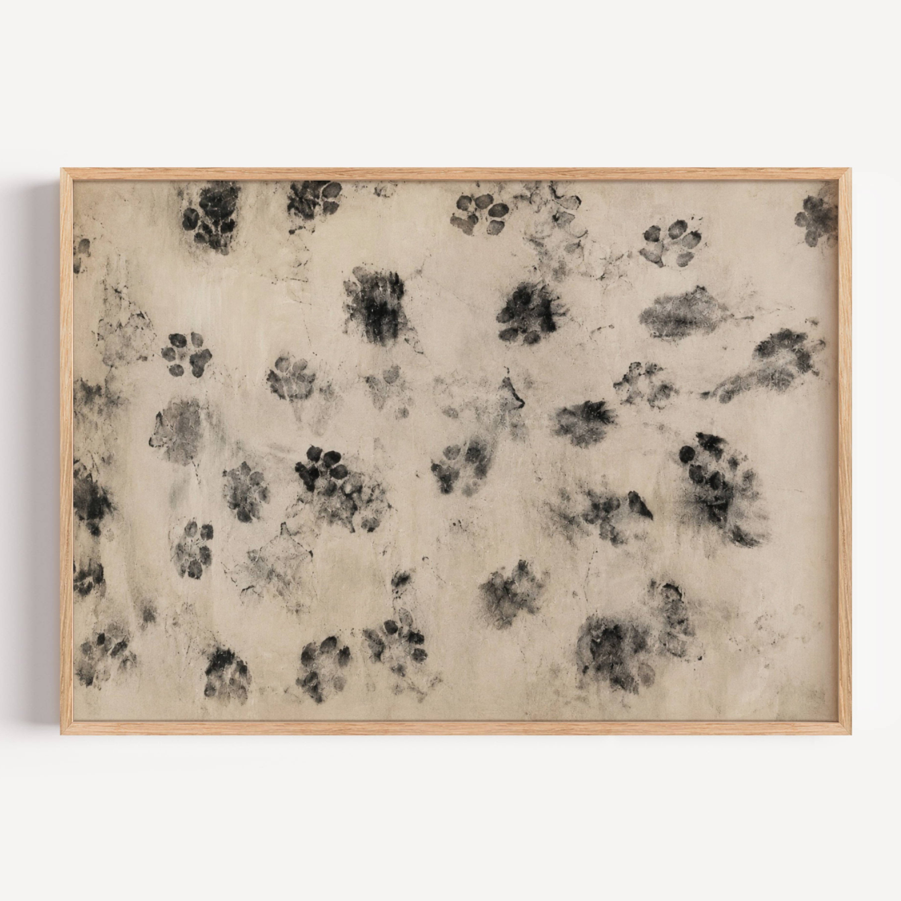 proof of life is a retro vintage wall art print with abstract dog paws scattered across a surface, on a textured neutral background. Featuring soft monochromatic markings in an abstract contemporary painting style.