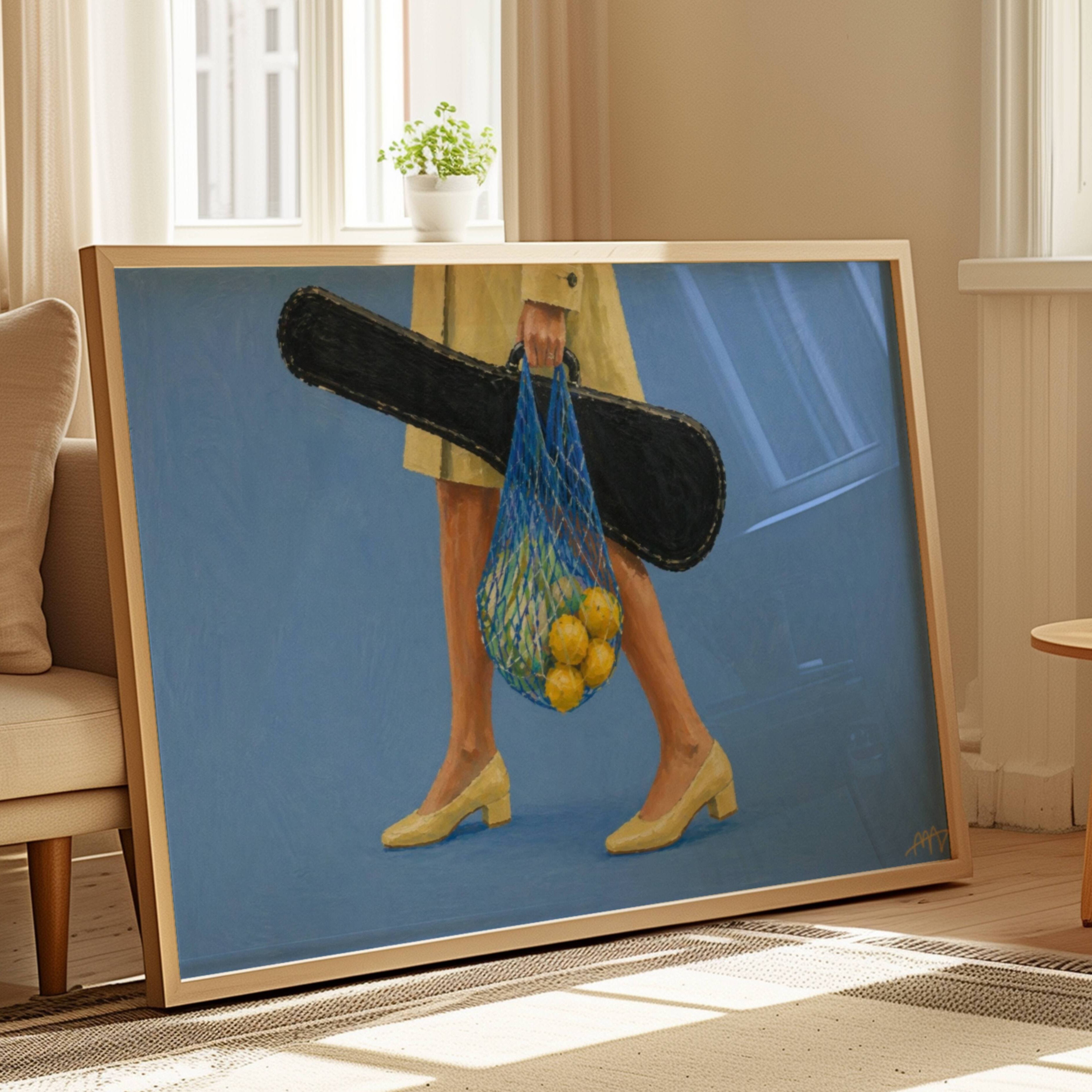 The Lemon Walk hand painted Contemporary and figurative wall art of a woman carrying lemons in a net bag alongside a guitar case against a blue background with expressive painterly texture. Minimalist Mid century modern Summer oil painting with lemons, vintage heels and a guitar case in cinematic composition