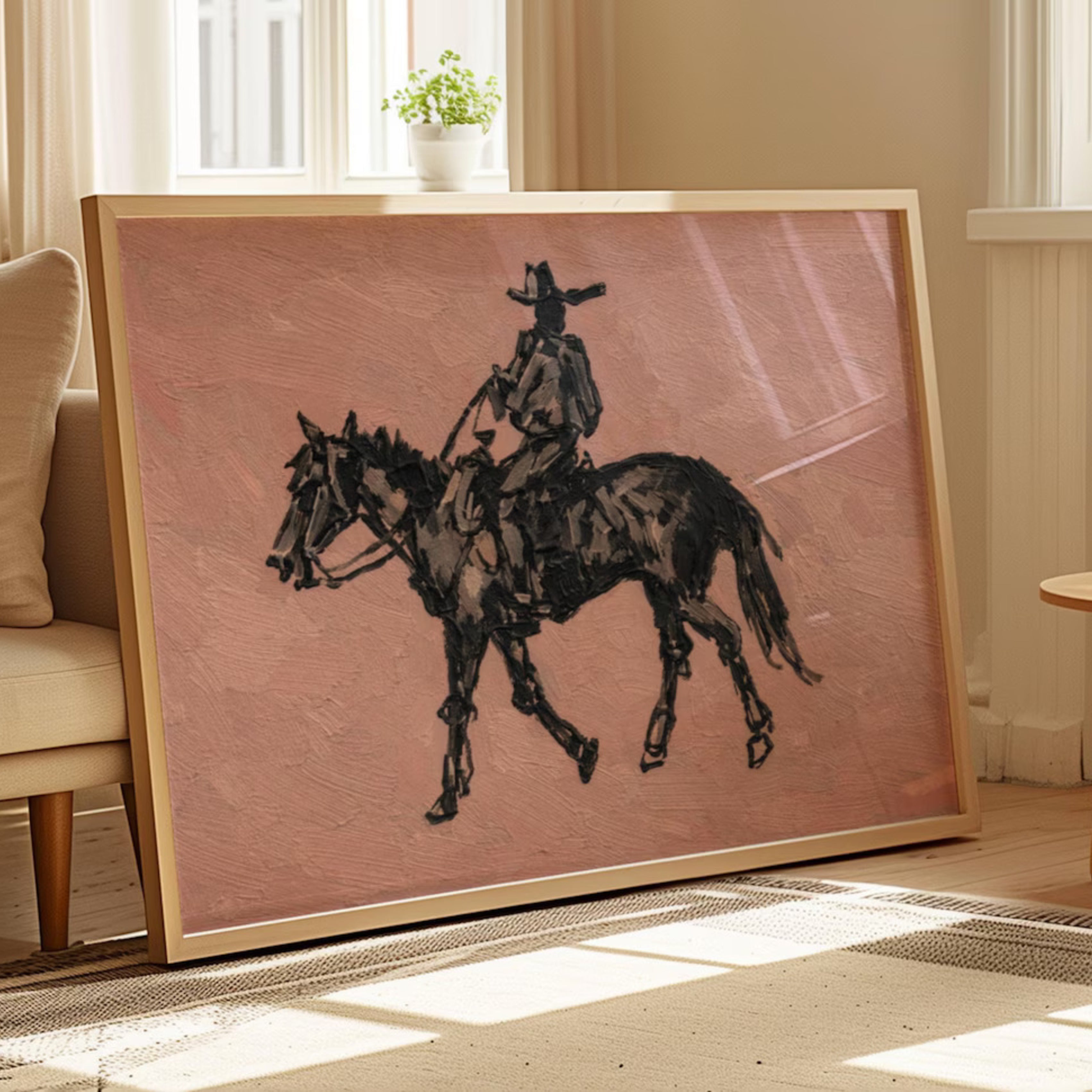 The Lone Rider is a minimalist Western Horse Artwork Featuring solitary rider cowboy on horseback against dusty rose pink background. This is a western Cowboy Oil painting wall art with painterly effect