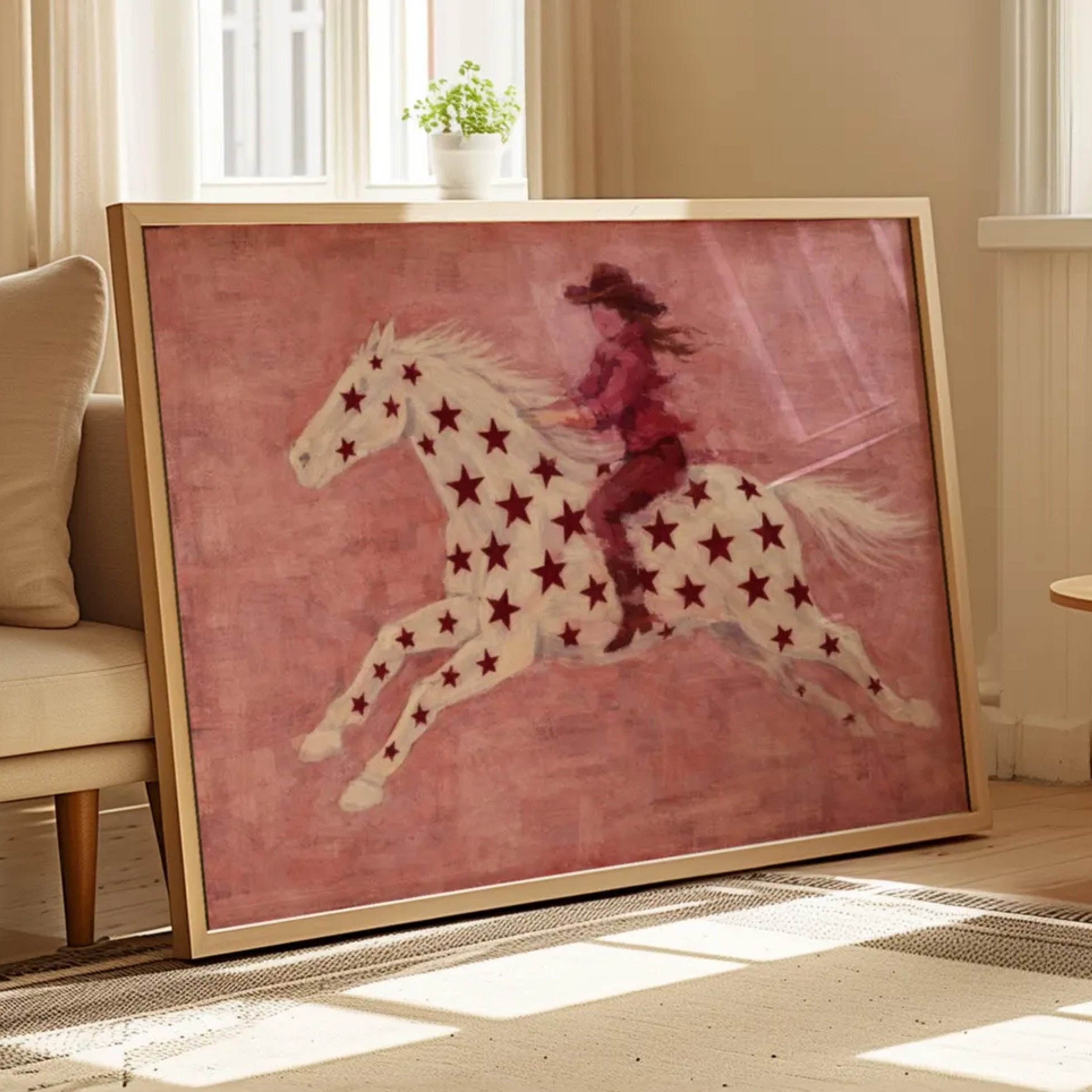 contemporary western folk style artwork of a cowgirl woman riding a star patterned horse with red burgundy stars on a pink background. hand drawn painterly effect