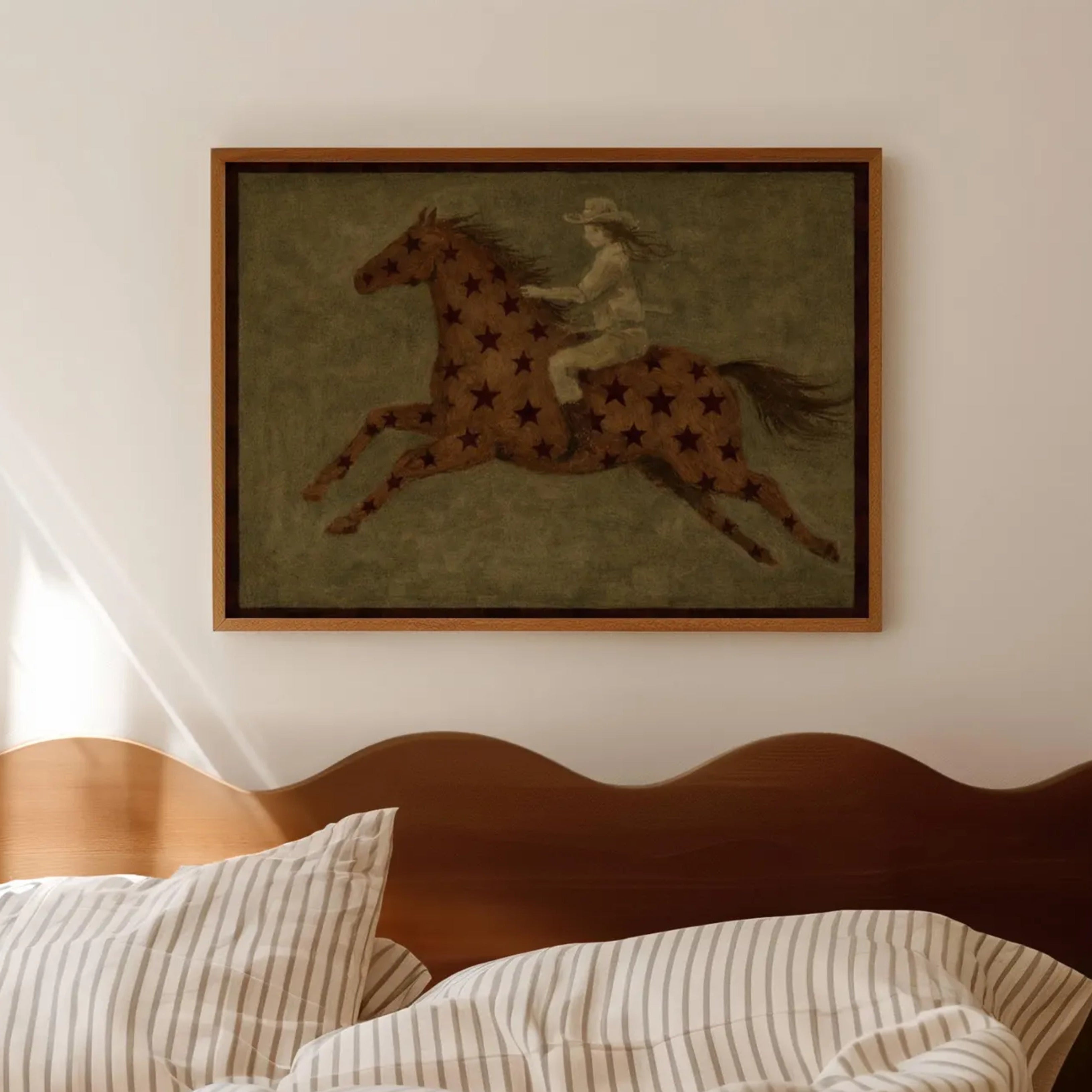 contemporary western folk style artwork of a cowgirl woman riding a star patterned horse with stars on a khaki background. hand drawn painterly effect