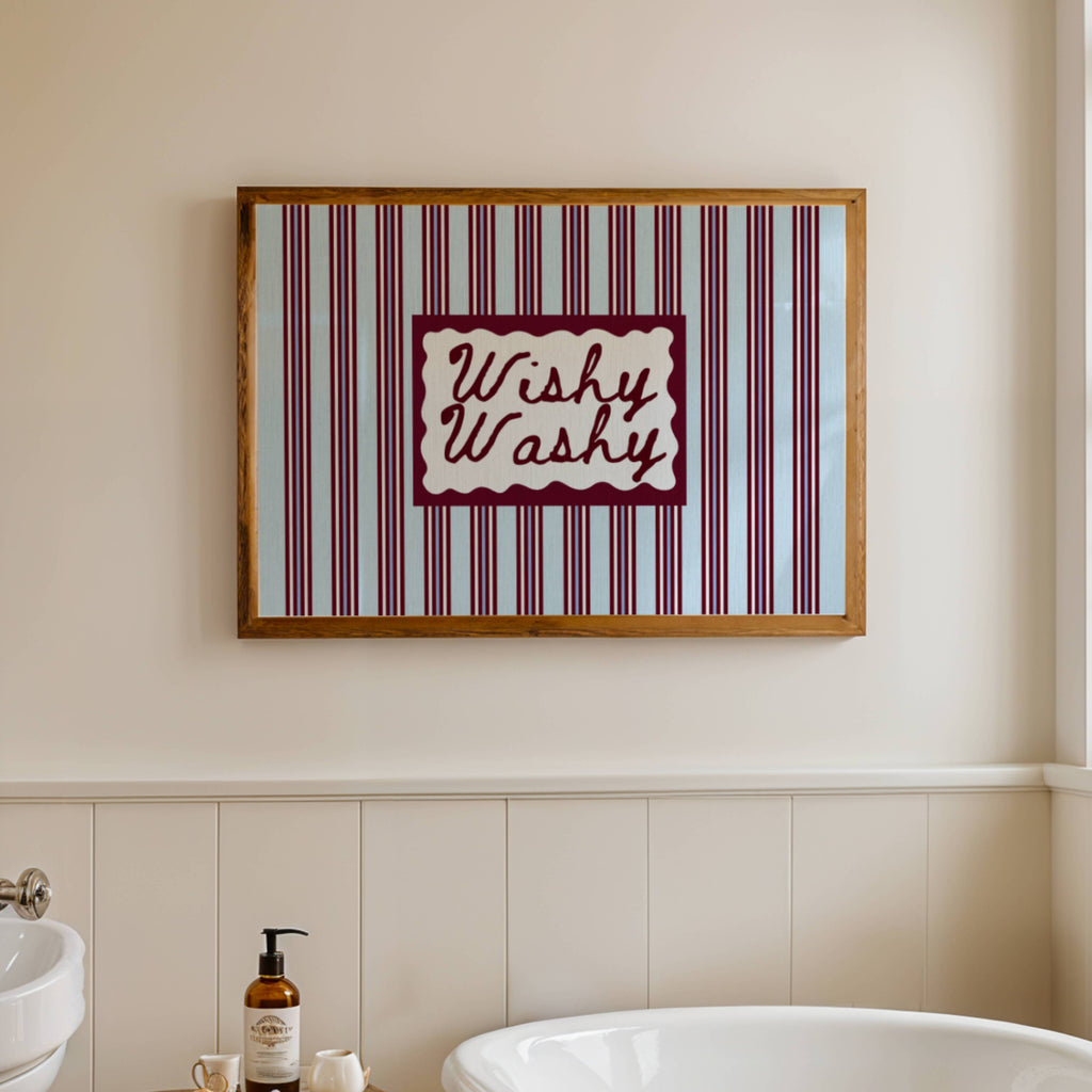 Wishy Washy is a whimsical Retro typography art print designed to bring humour, colour and personality into your bathroom and laundry room. Featuring vintage-inspired striped patterns and hand-lettered typography, this artwork captures the nostalgic charm of classic bath-time phrases while adding a playful decorative touch to modern interiors. this is a hand drawn Retro quote wall art featuring, ideal for bathrooms, laundry room decor, and cheeky playful interiors. available in 4 different colors: butter ye