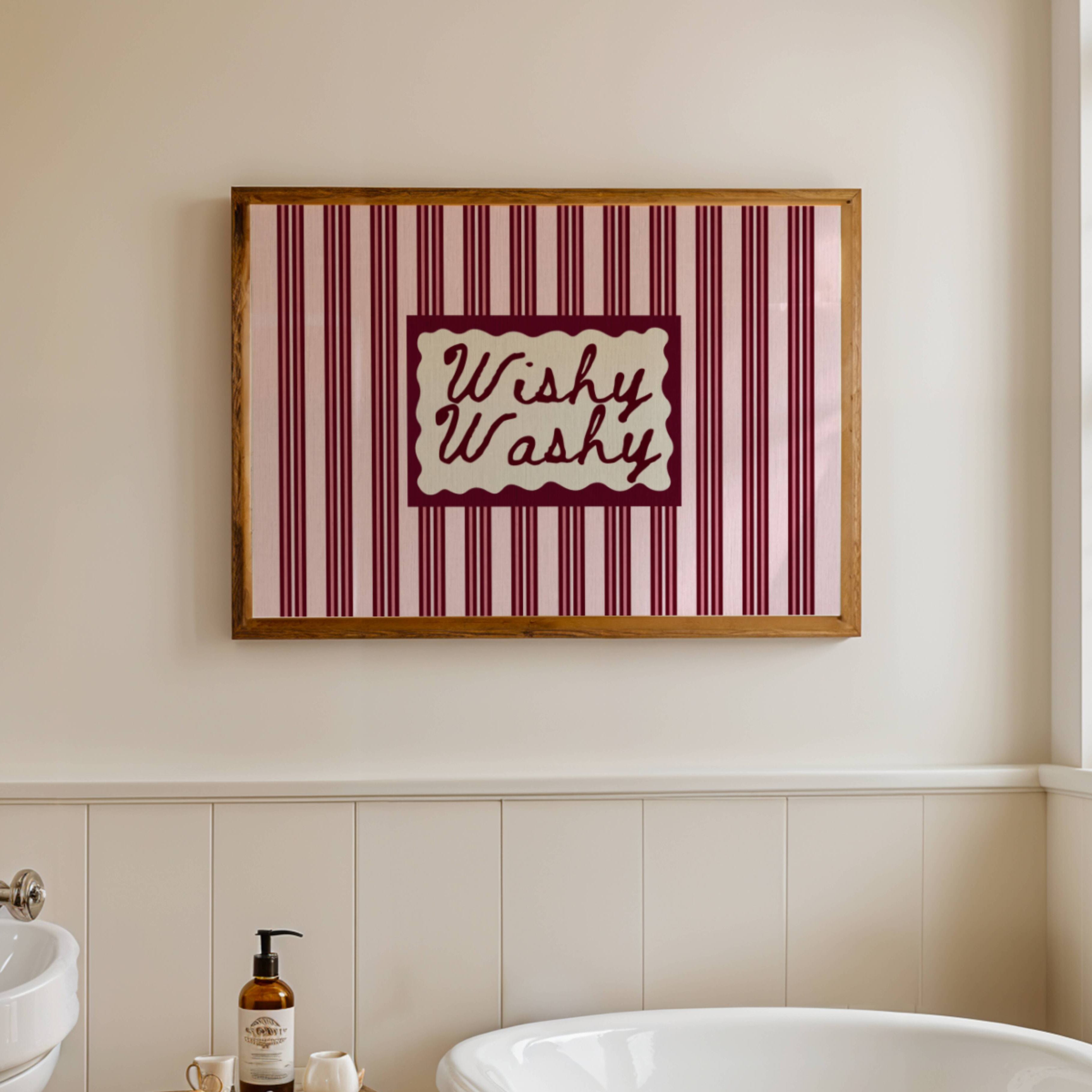 Wishy Washy is a whimsical Retro typography art print designed to bring humour, colour and personality into your bathroom and laundry room. Featuring vintage-inspired striped patterns and hand-lettered typography, this artwork captures the nostalgic charm of classic bath-time phrases while adding a playful decorative touch to modern interiors. this is a hand drawn Retro quote wall art featuring, ideal for bathrooms, laundry room decor, and cheeky playful interiors. available in 4 different colors: butter ye