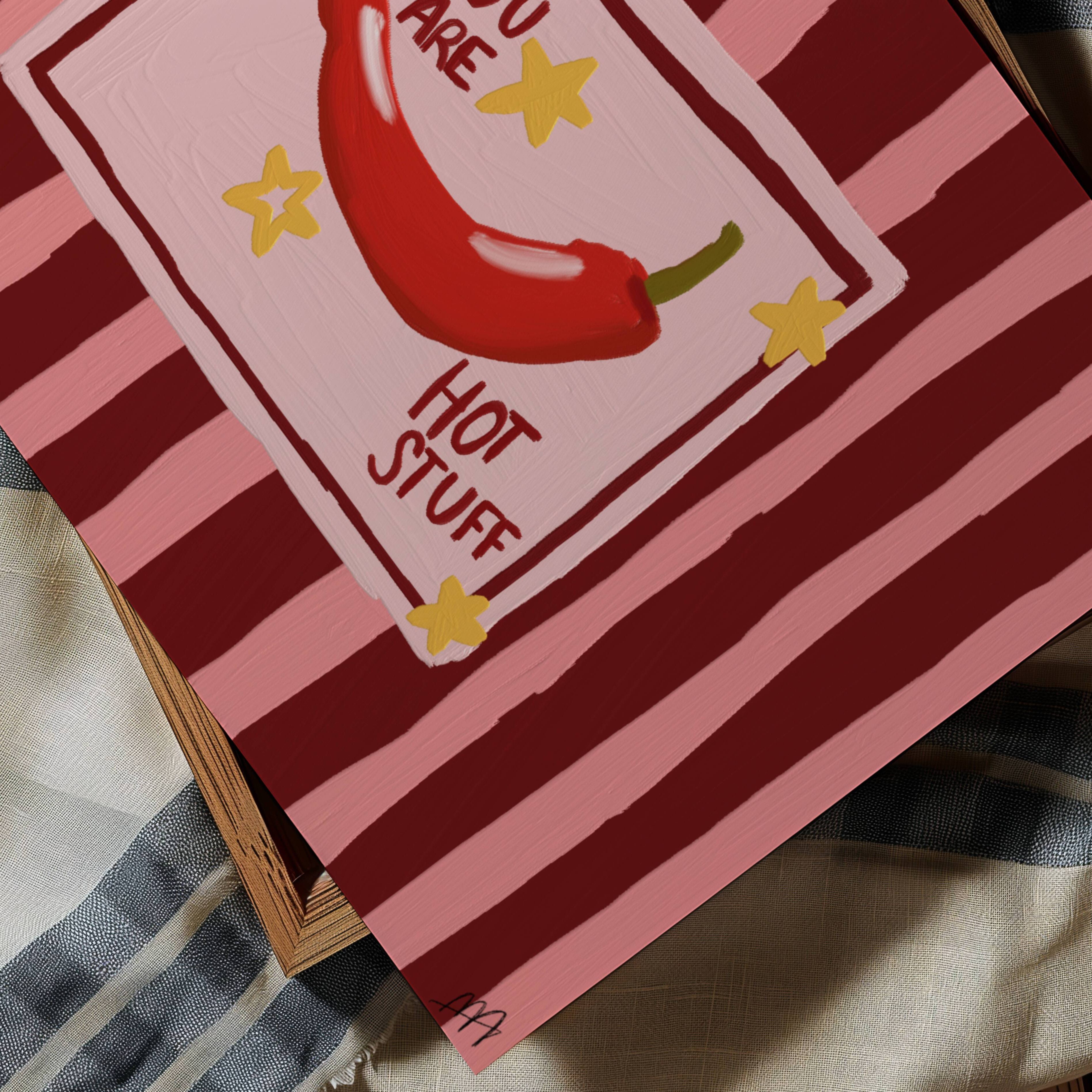 Playful Hand drawn Kitchen Funny Typography wall art with a hot red chilli peper illustration and the phrase "You are Hot Stuff" on a retro striped background in pink and ruby tones. This is a hand drawn Oil Painting kitchen and bar cart art Print decor for playful kitchens, dining spaces and eclectic interiors.