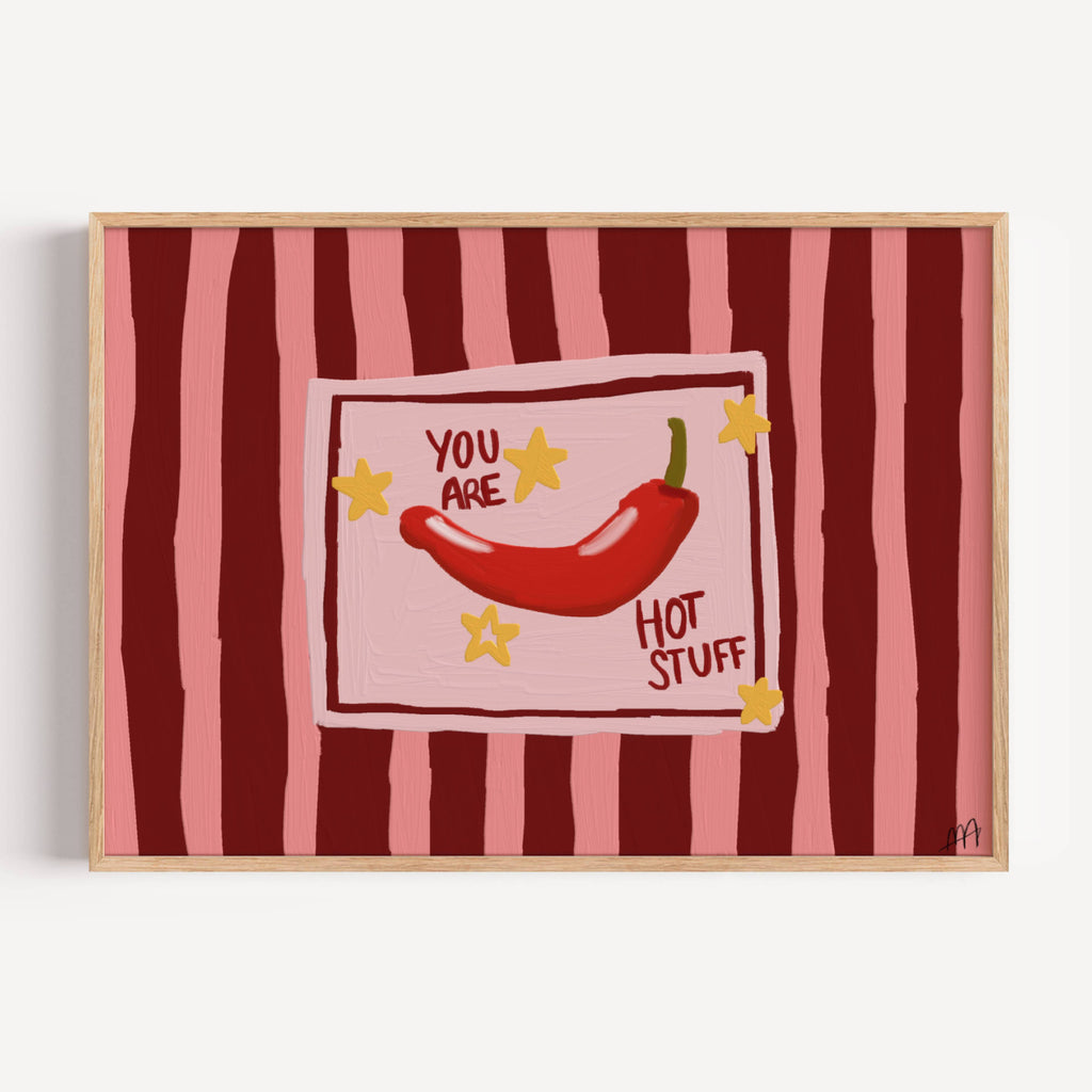 Playful Hand drawn Kitchen Funny Typography wall art with a hot red chilli peper illustration and the phrase "You are Hot Stuff" on a retro striped background in pink and ruby tones. This is a hand drawn Oil Painting kitchen and bar cart art Print decor for playful kitchens, dining spaces and eclectic interiors.