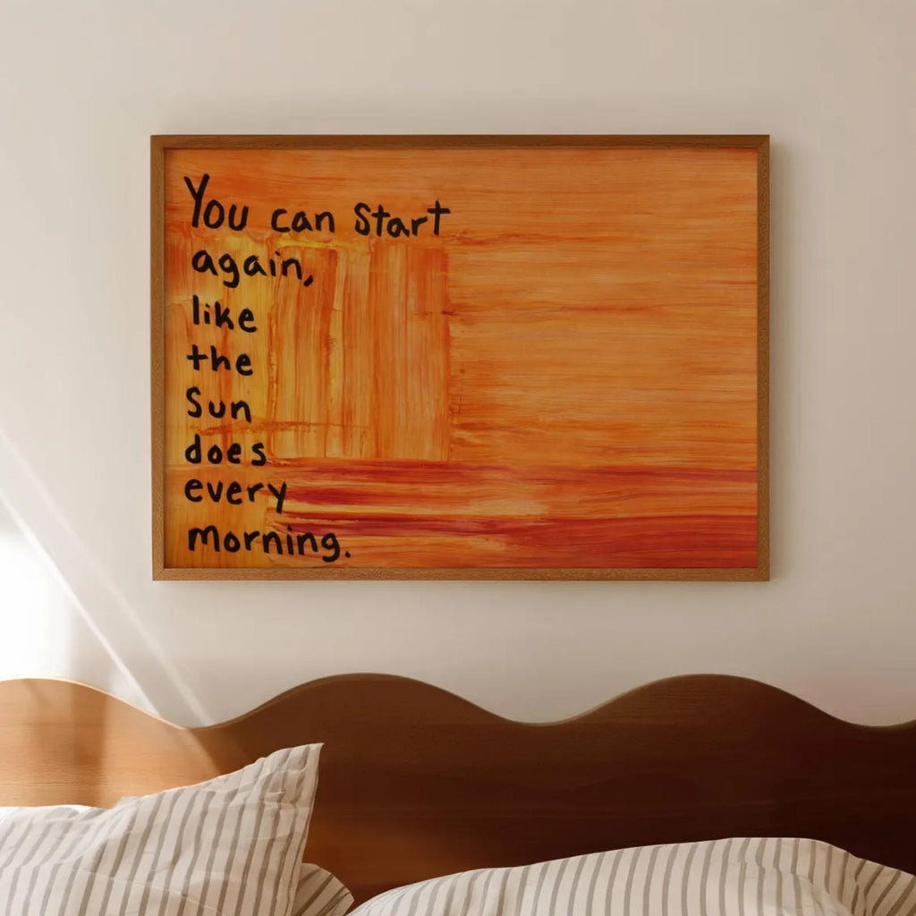 hand drawn Trendy typography abstract print with the motivational quote "You can start again like the sun does every morning" in a textured abstract gradient painted canva in sunset colors. This is a trendy grafitti style typography wall art print ideal for above bed, bedrooms, dorm room decor, living rooms and kitchens, gallery walls and playful interiors. The perfect Cool Girl Apartment decor