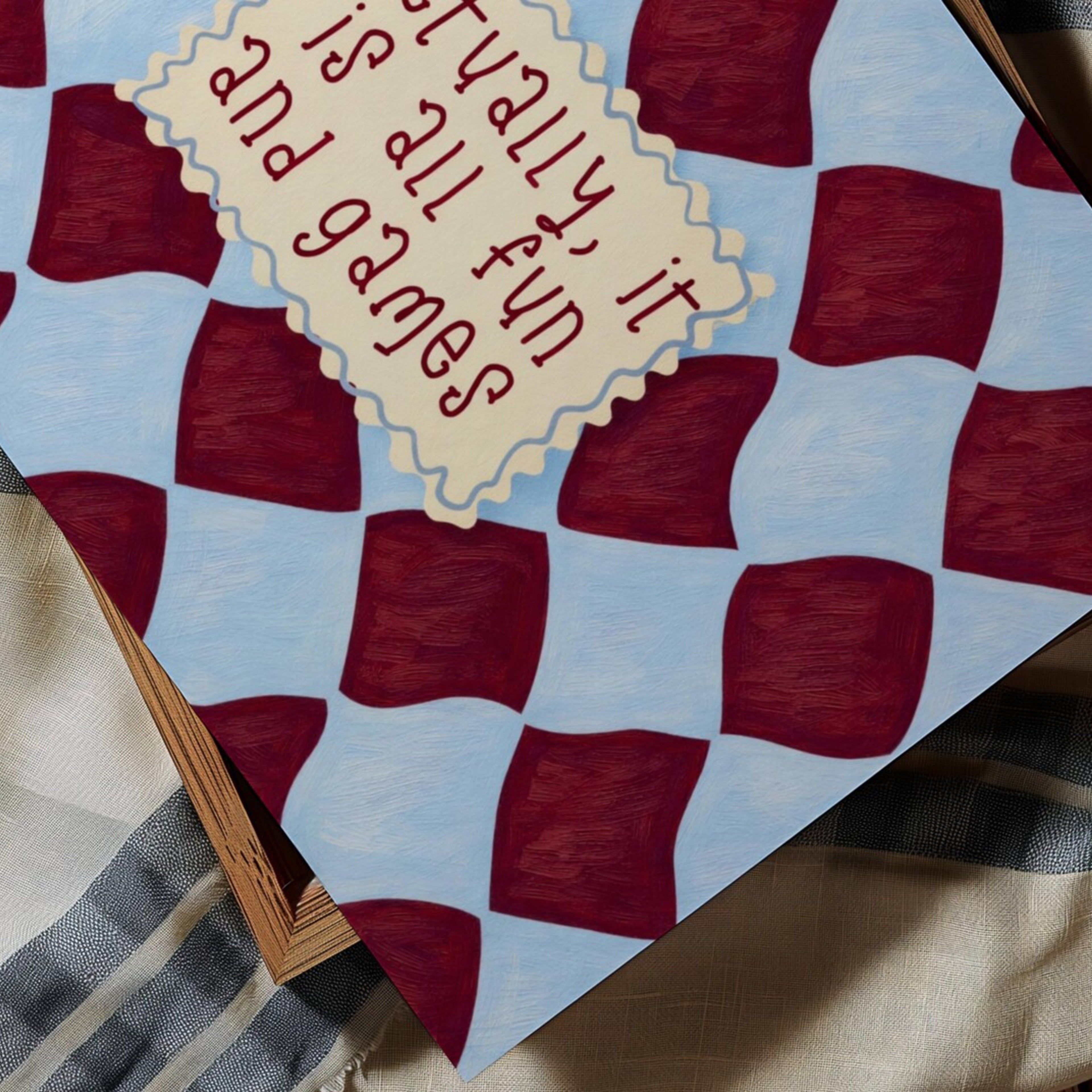 hand drawn Playful typography print with the phrase "actually its all fun and games" in a retro checkered blue and ruby burgundy, on textured oil painting canva. This is a hand drawn trendy funny typography wall art print ideal for above bed, bedrooms, dorm room decor, living rooms and kitchens, gallery walls and playful interiors.