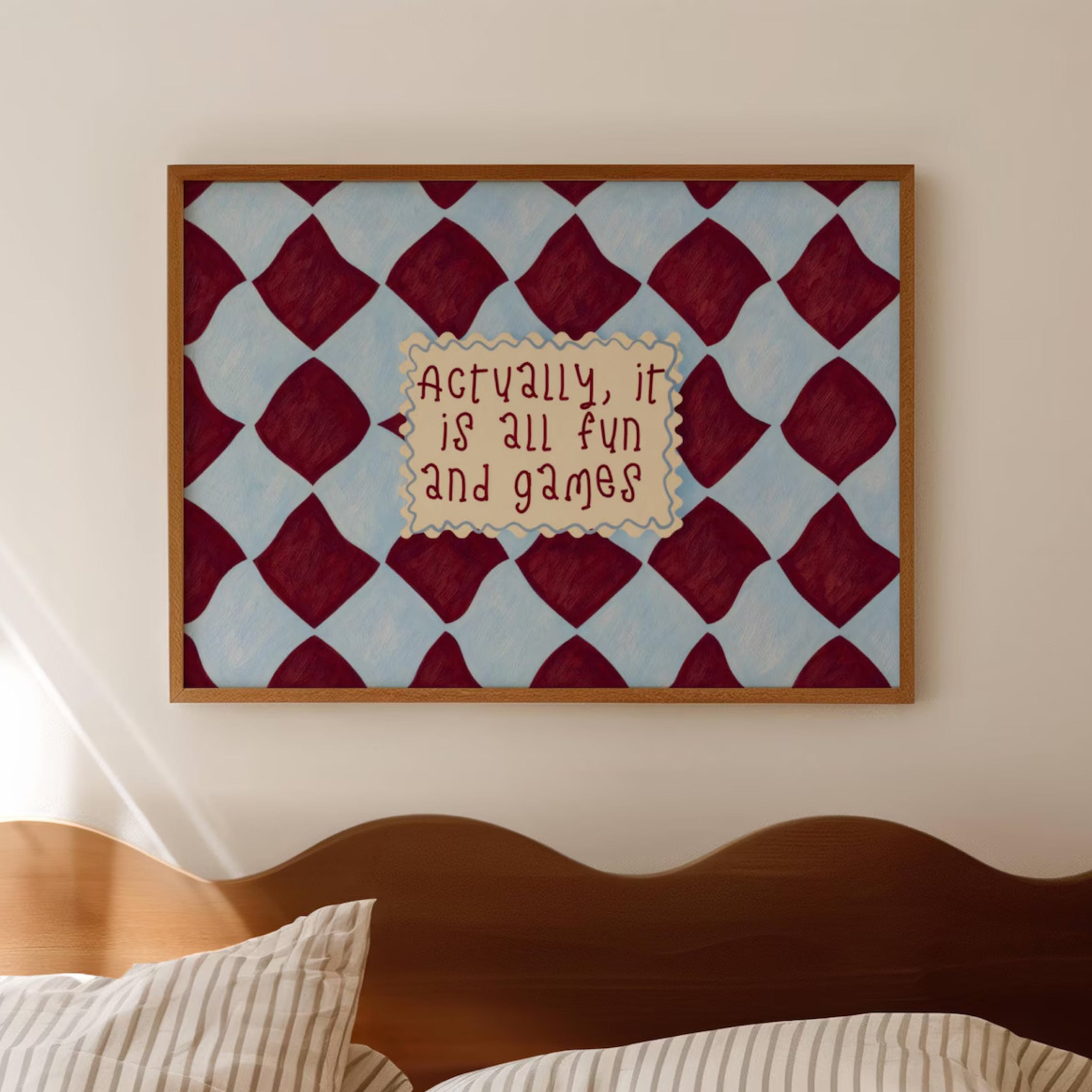 hand drawn Playful typography print with the phrase "actually its all fun and games" in a retro checkered blue and ruby burgundy, on textured oil painting canva. This is a hand drawn trendy funny typography wall art print ideal for above bed, bedrooms, dorm room decor, living rooms and kitchens, gallery walls and playful interiors.