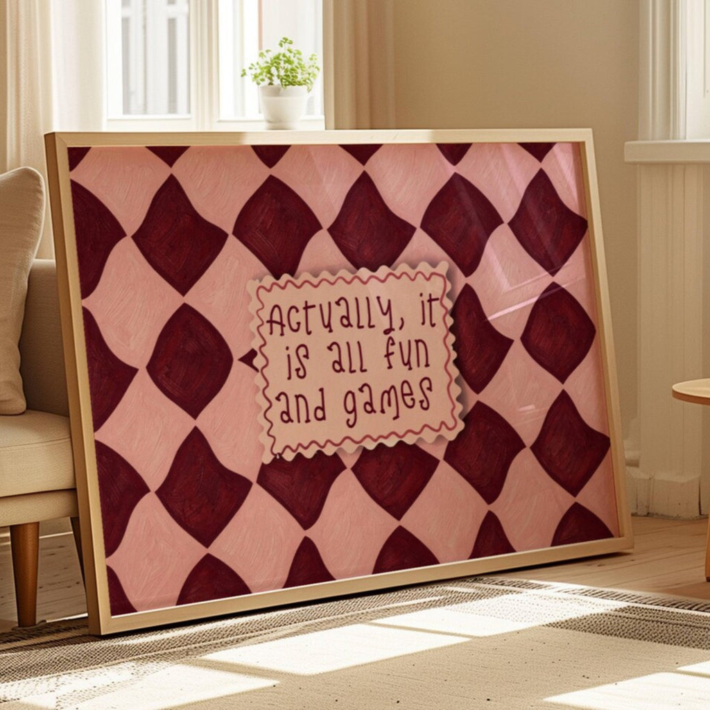 hand drawn Playful typography print with the phrase "actually its all fun and games" in a retro checkered pink and ruby burgundy, on textured oil painting canva. This is a hand drawn trendy funny typography wall art print ideal for above bed, bedrooms, dorm room decor, living rooms and kitchens, gallery walls and playful interiors