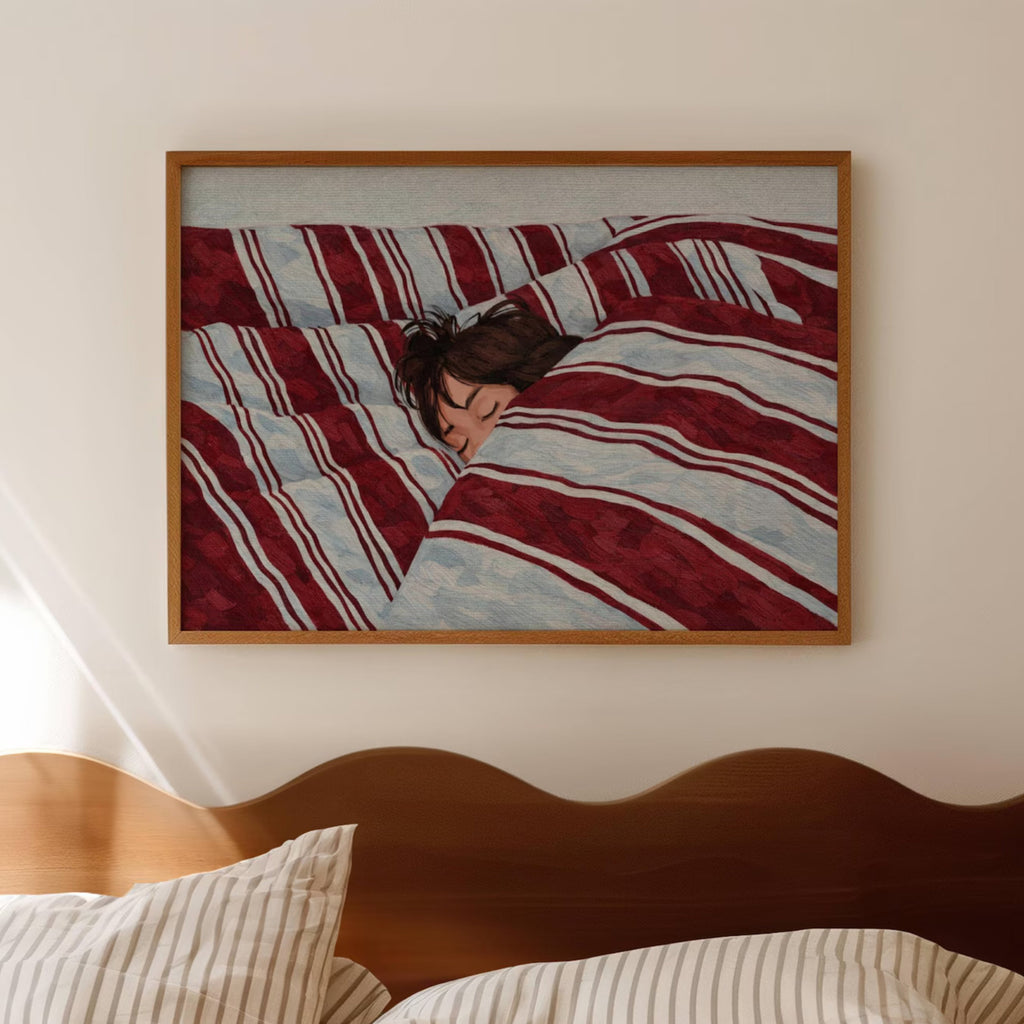 against all productivity is a hand painted wall art print of a sleeping womam in striped bedding, in blue and burgundy tones, inspired by slow mornings and nostalgic interiors, symbolizing quiet luxury and unhurried mornings. Horizontal above bed oil painting wall art print . sunday morning aesthetic intimate wall art
